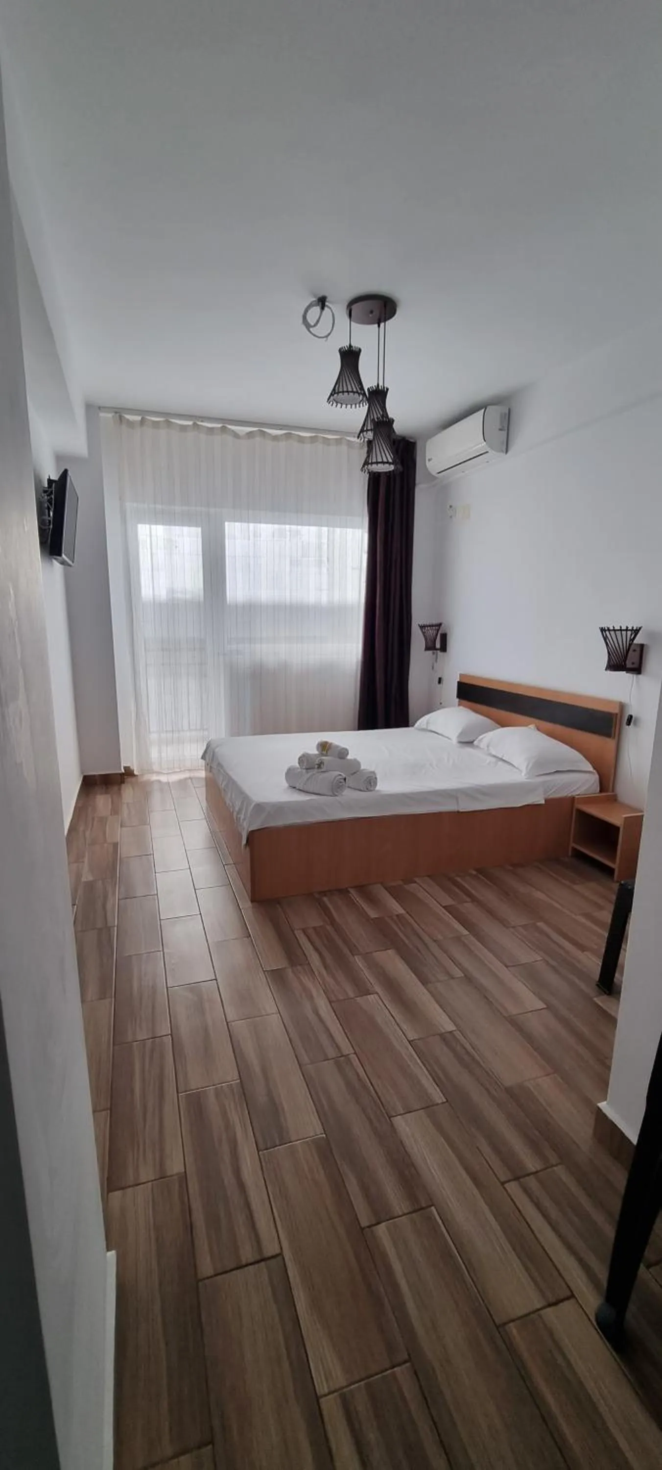 Bed in Hotel Blue Sky Resort