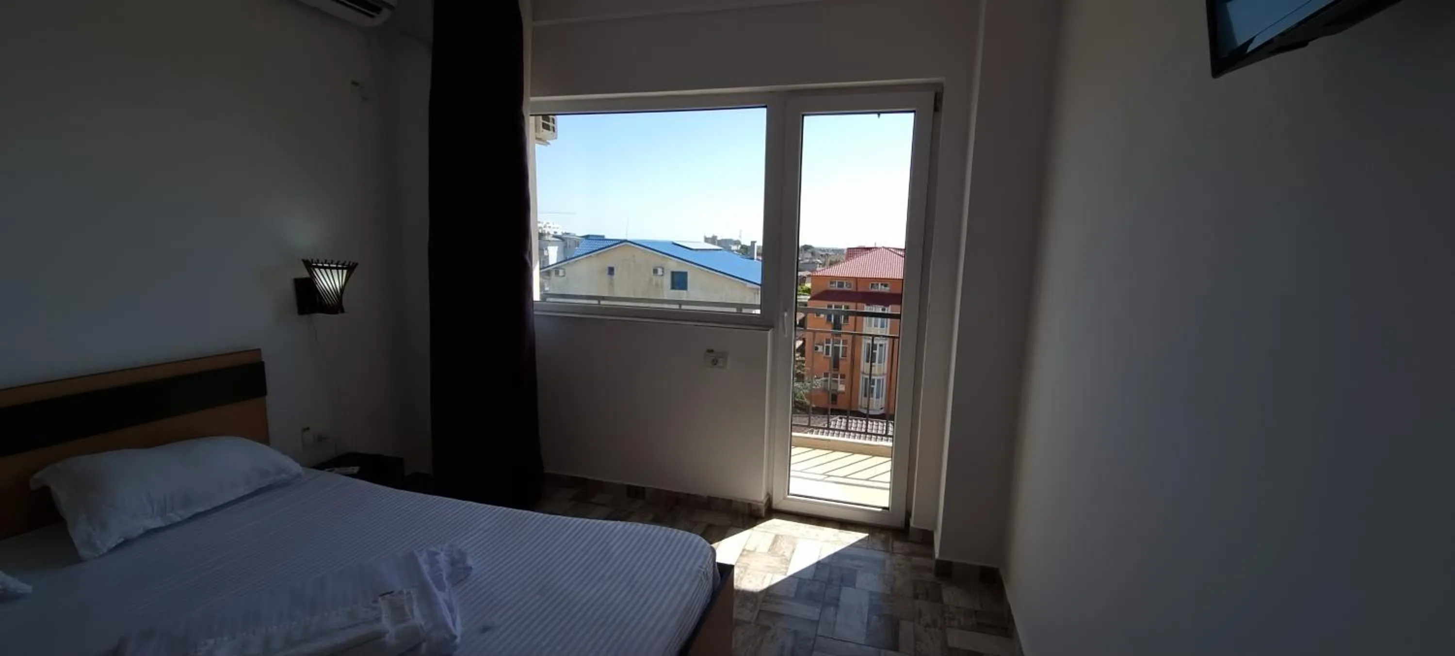 Bed in Hotel Blue Sky Resort