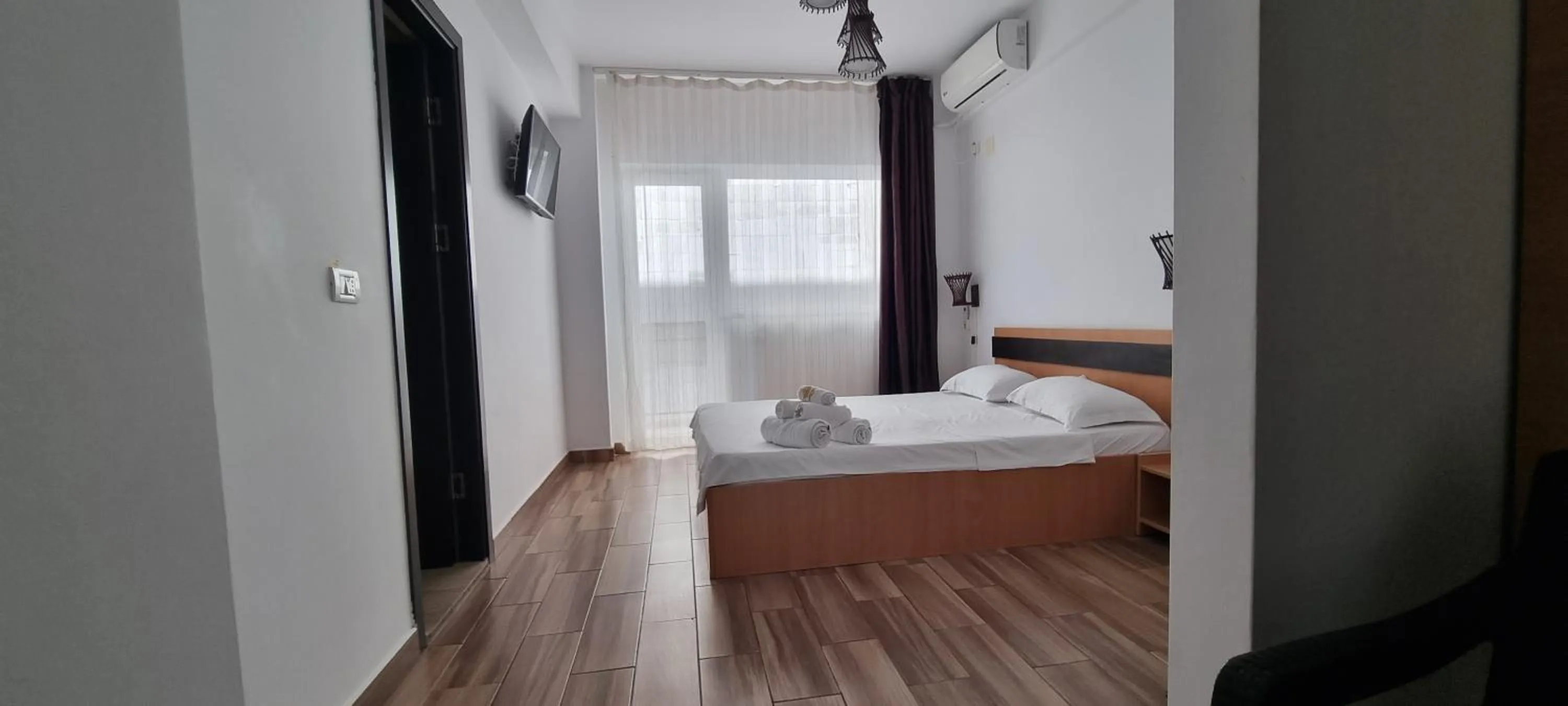 Bed in Hotel Blue Sky Resort