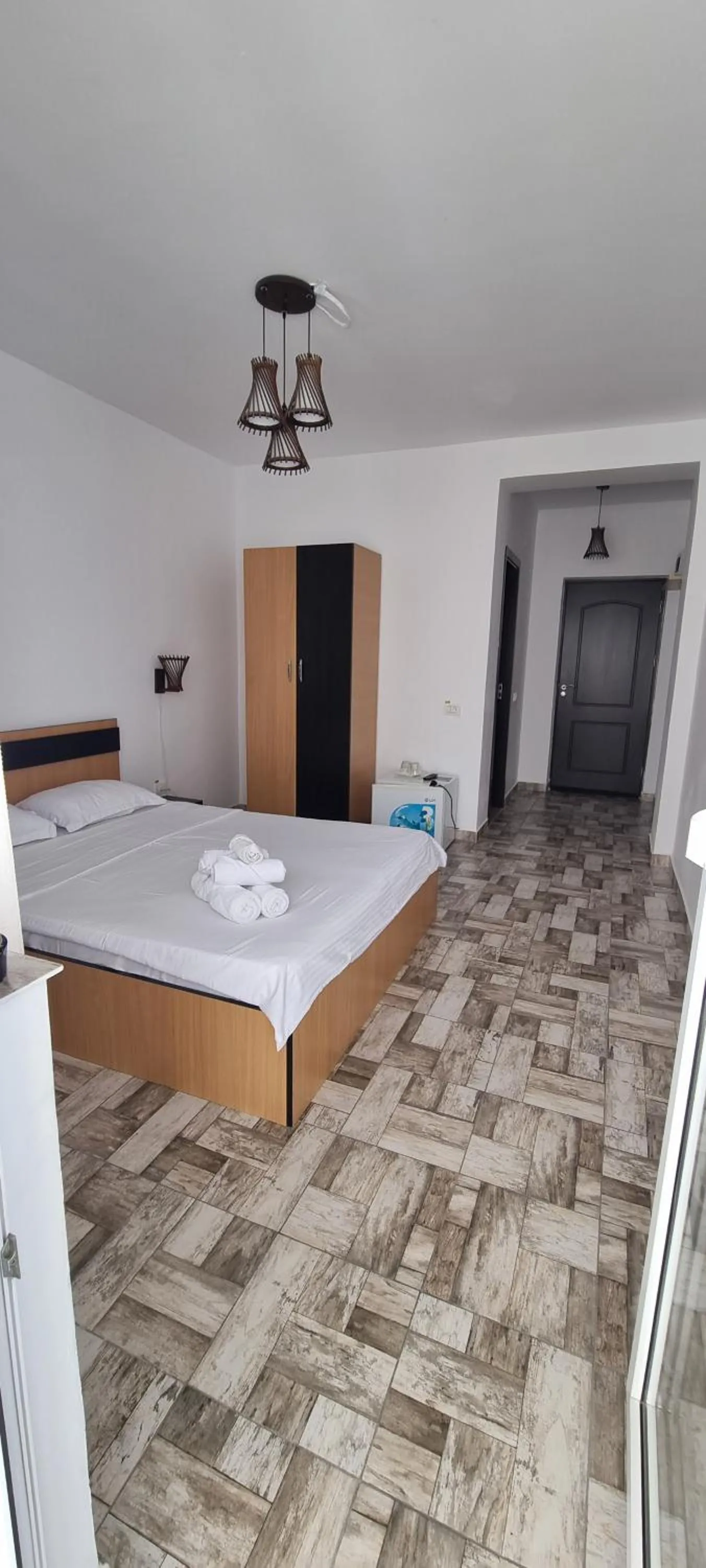 Bed in Hotel Blue Sky Resort