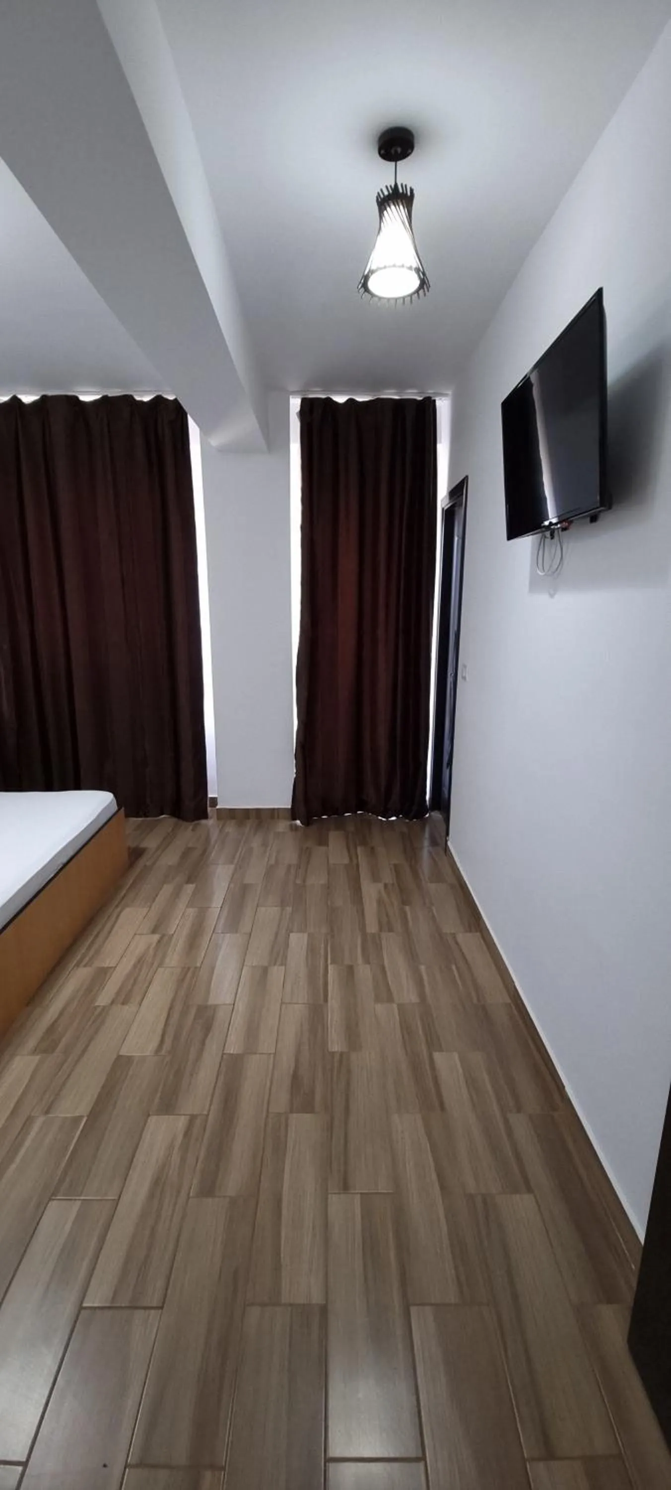 Bed in Hotel Blue Sky Resort