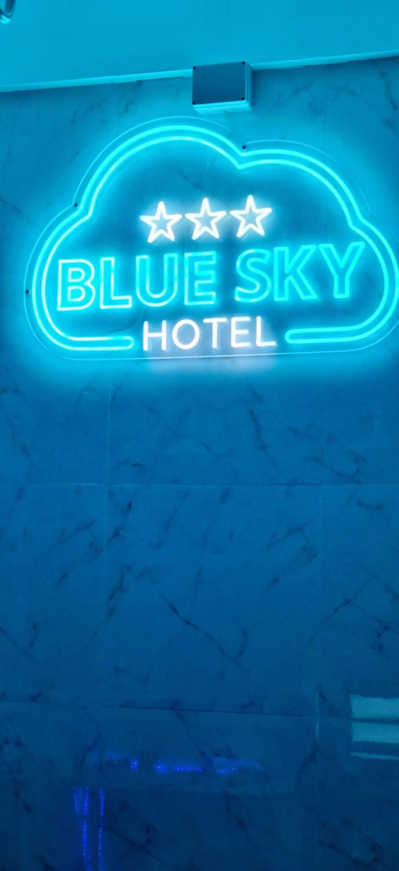 Property logo or sign in Hotel Blue Sky Resort