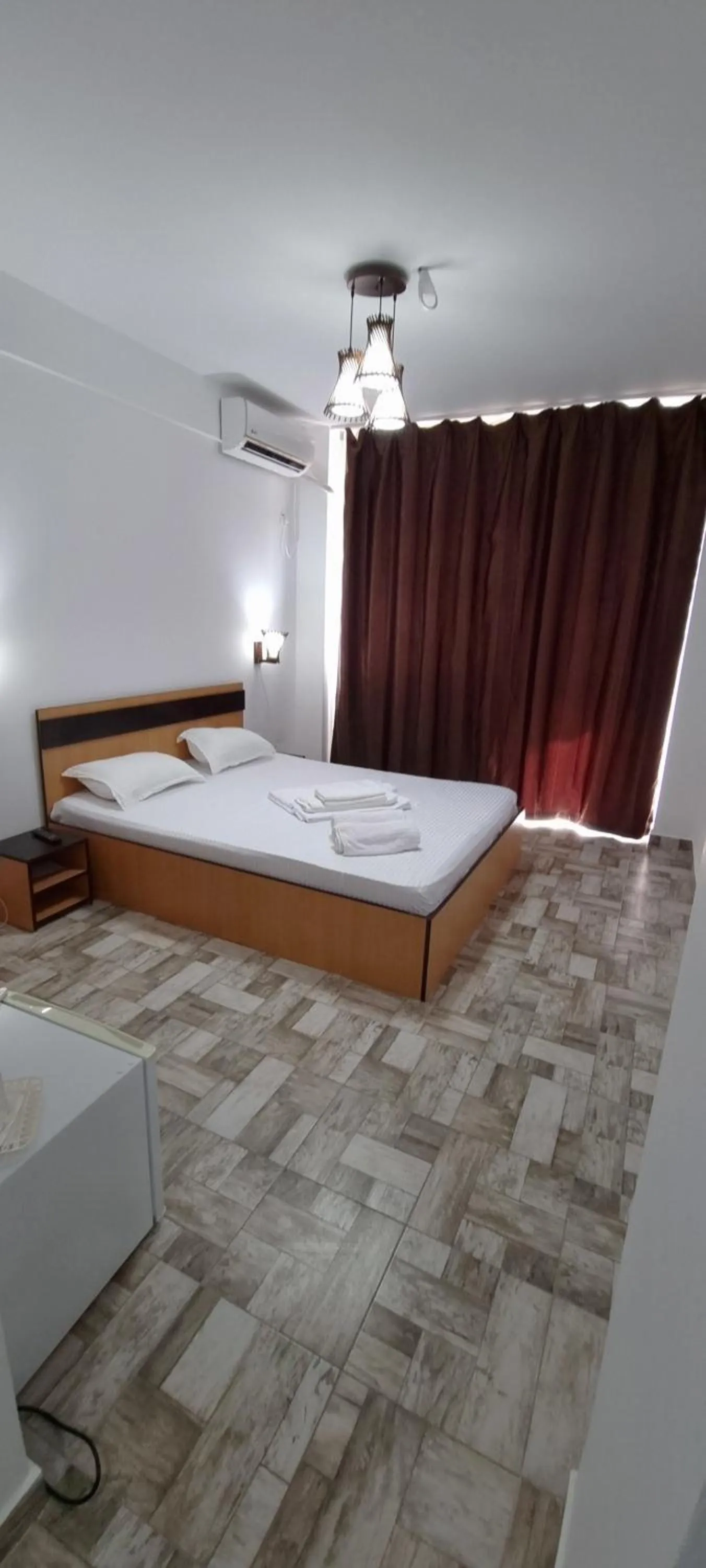 Bed in Hotel Blue Sky Resort