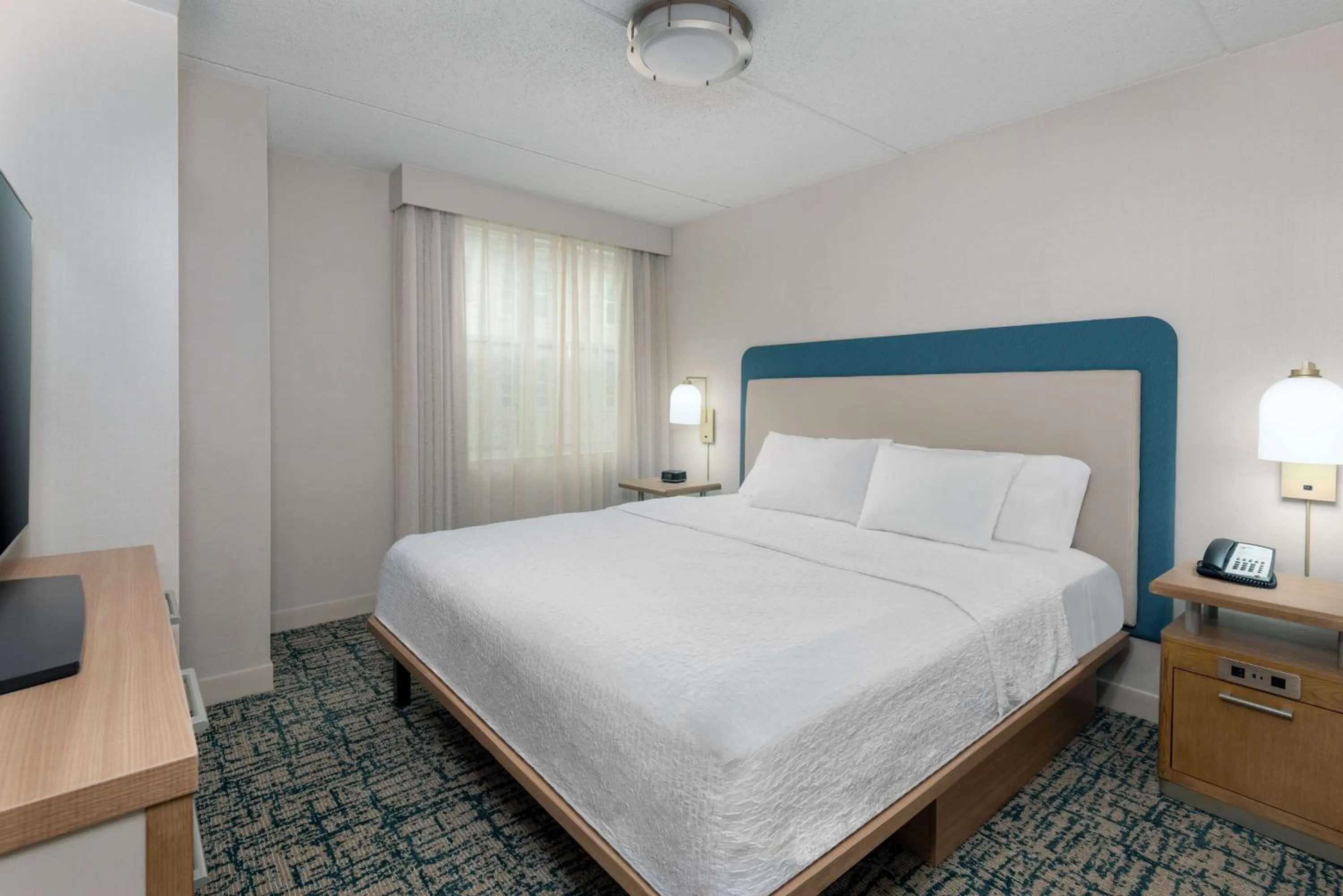 Bed in Homewood Suites by Hilton Buffalo/Airport