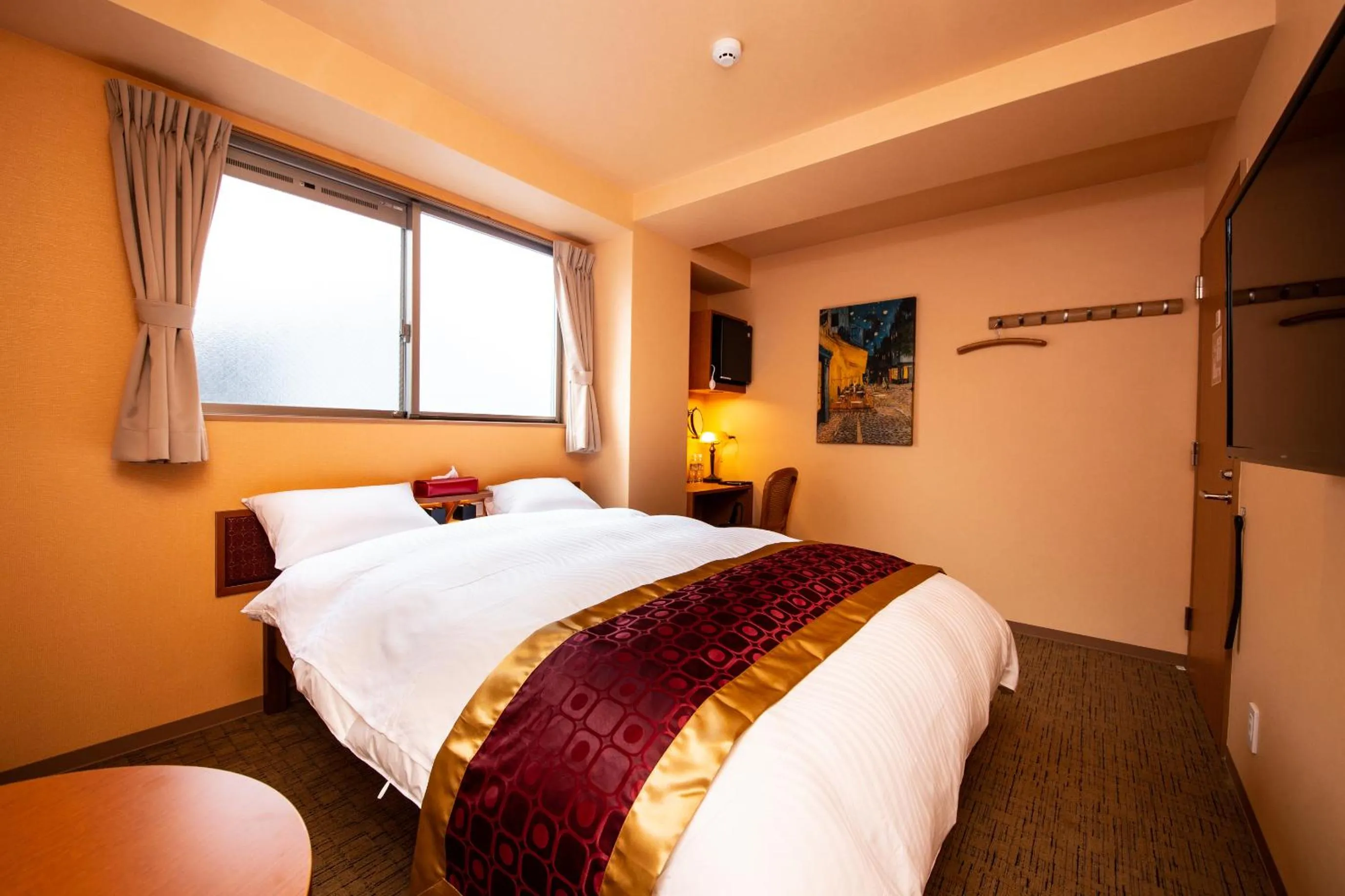 Bed in THE L.A. MART HOTEL KYOTO