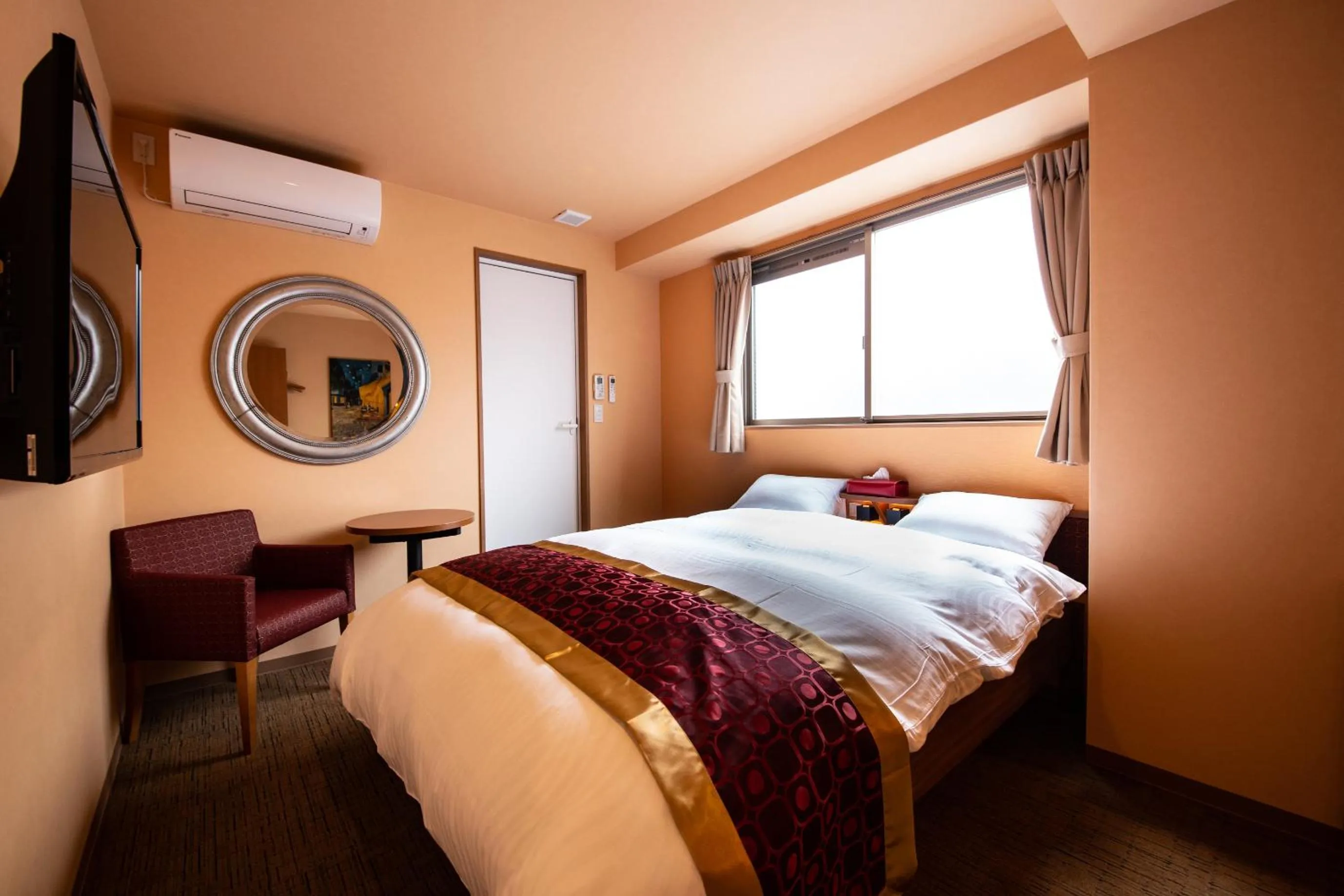 Bed in THE L.A. MART HOTEL KYOTO