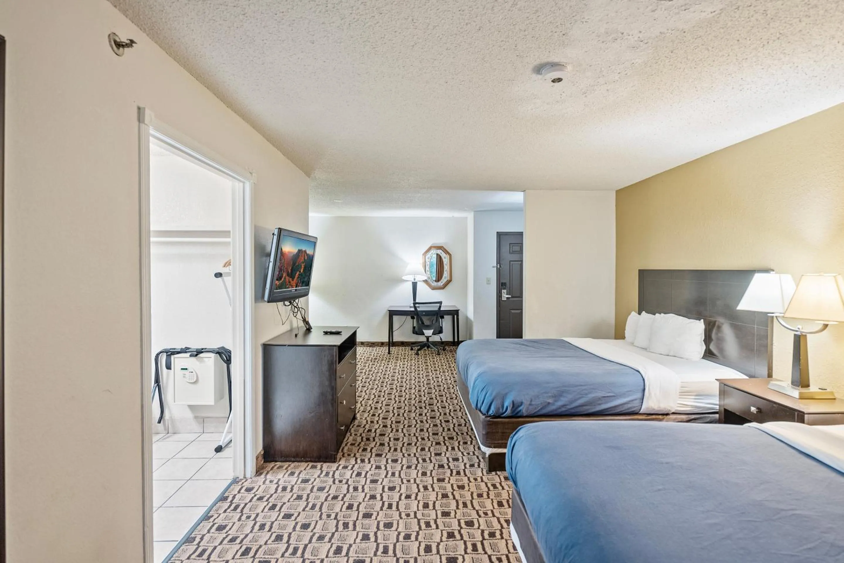 Bedroom, Bed in Coratel Plus Suites Wichita West Airport