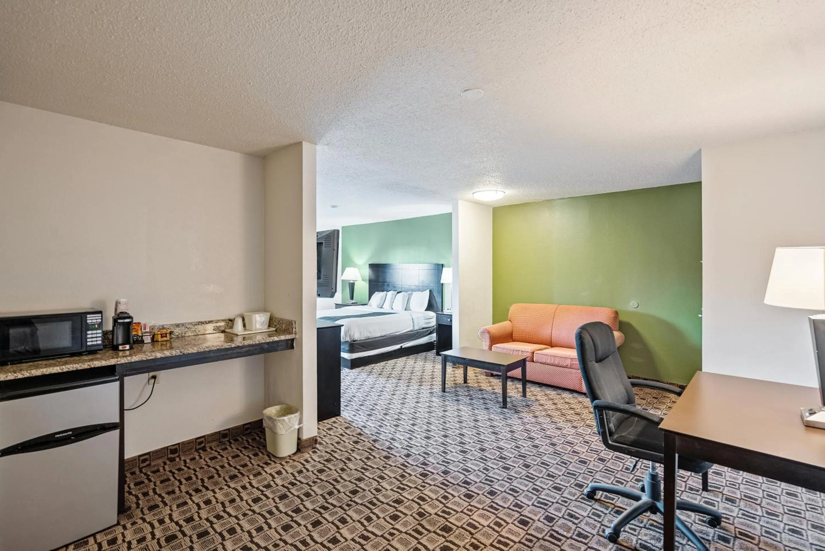 Bedroom, Bed in Coratel Plus Suites Wichita West Airport