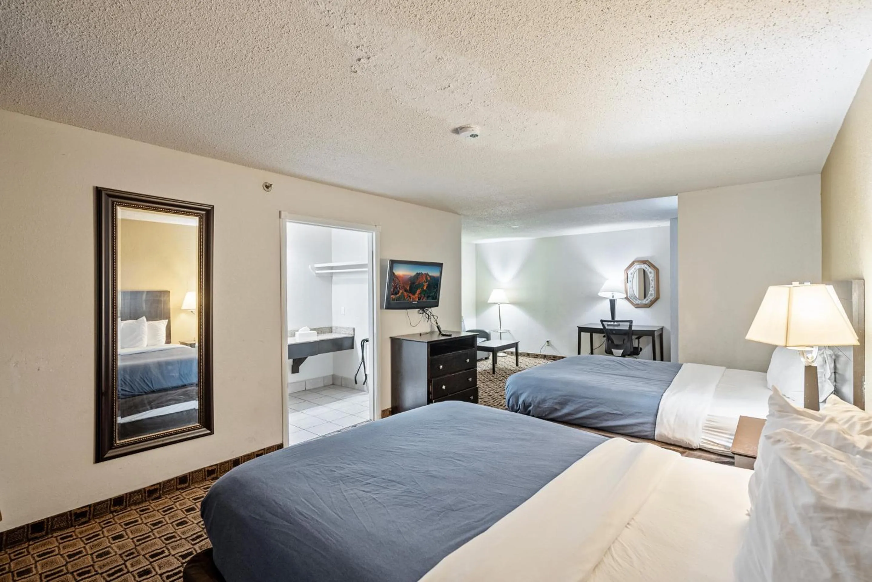 Bedroom, Bed in Coratel Plus Suites Wichita West Airport