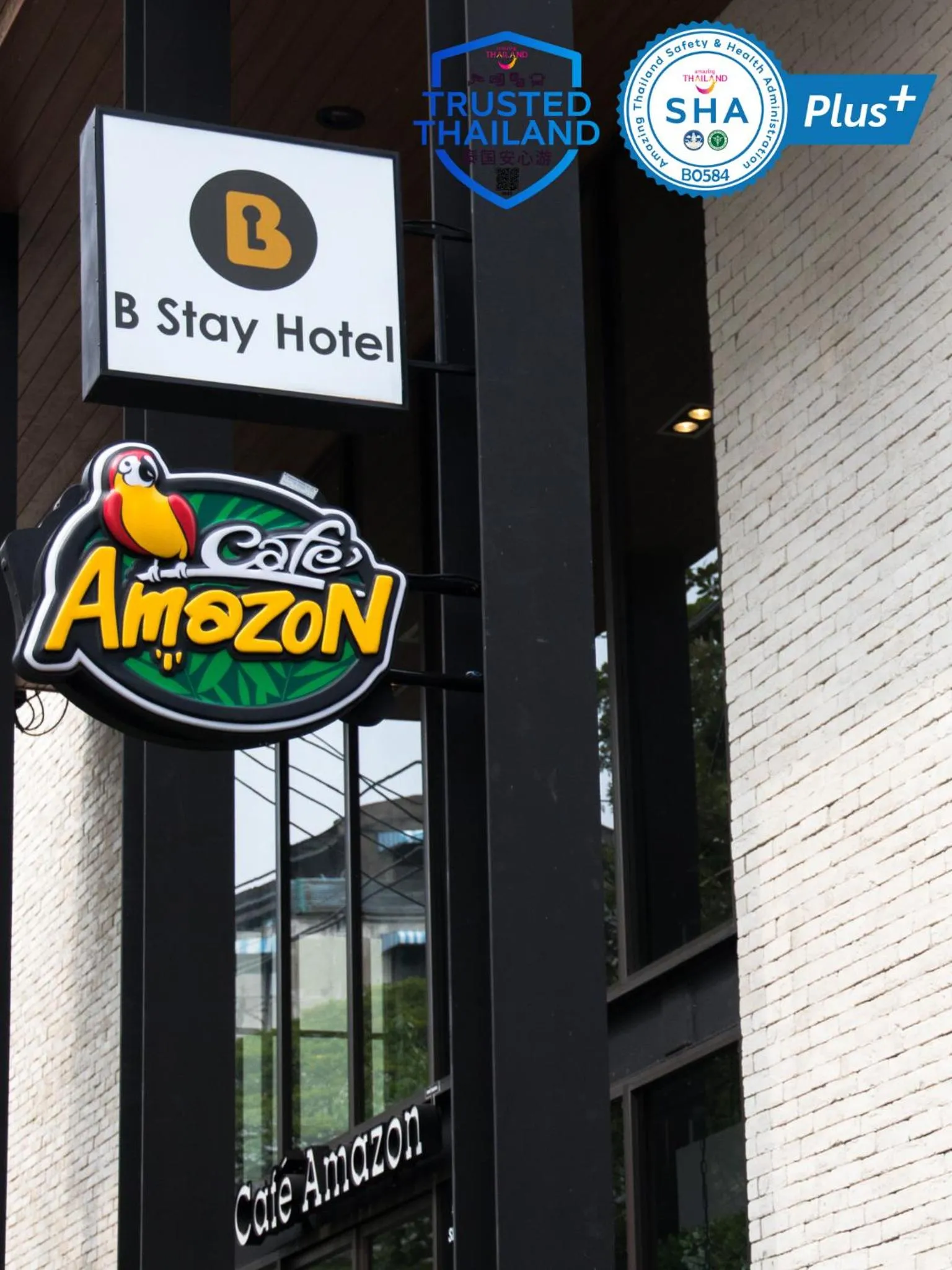 Property logo or sign in B Stay Hotel