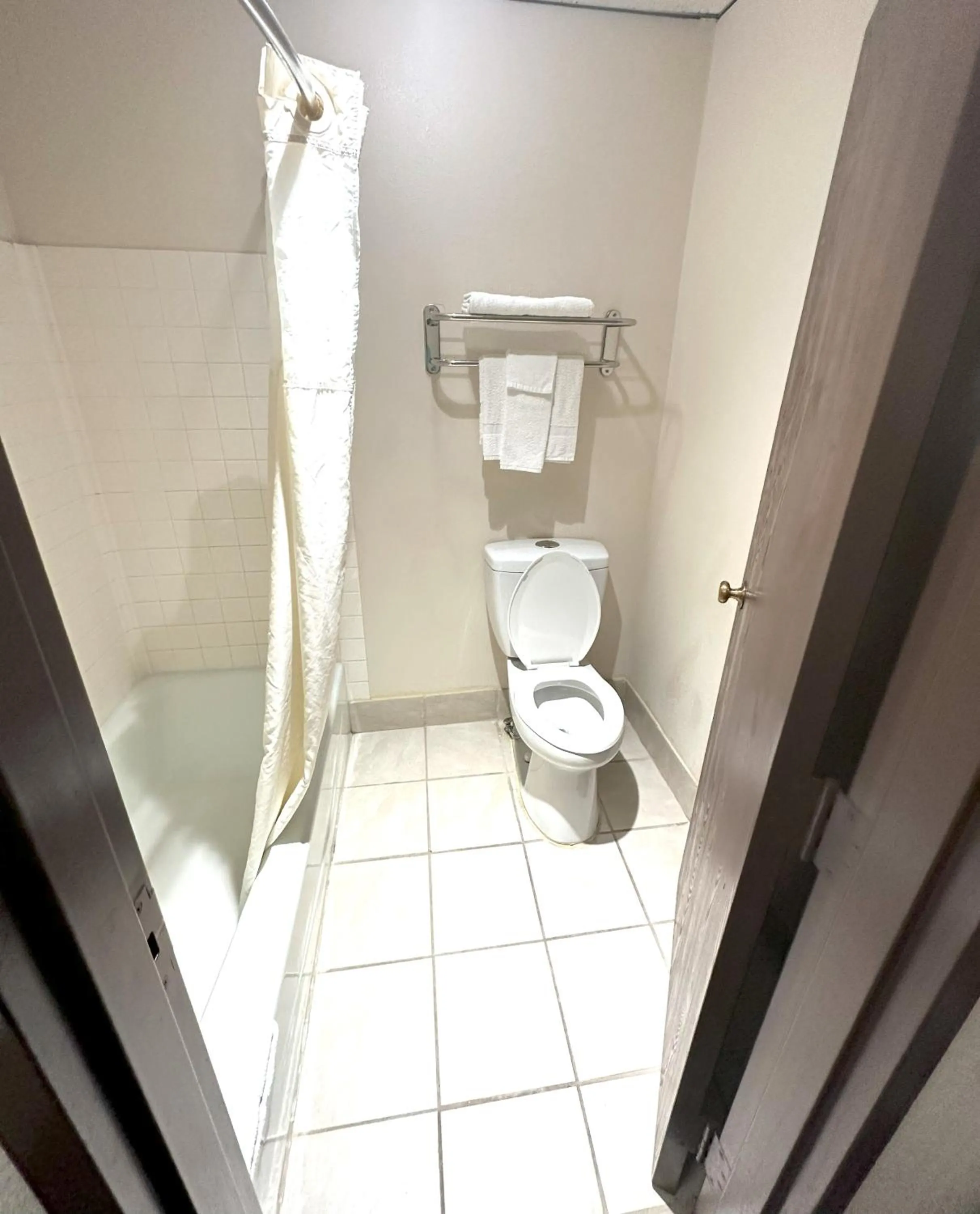 Bathroom in Sunflower Inn & Suites