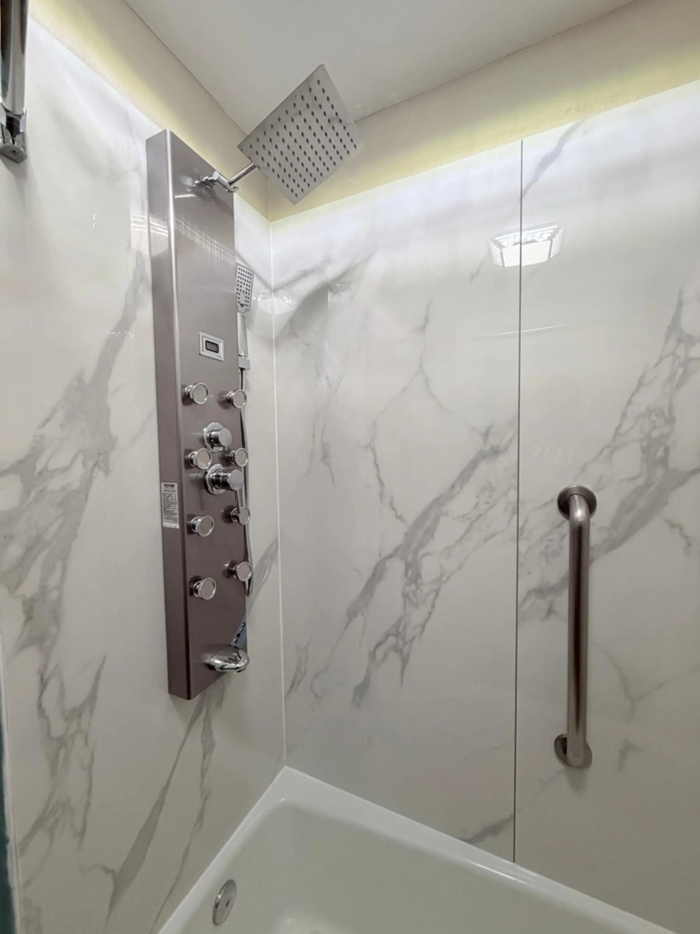 Bathroom in Sunflower Inn & Suites