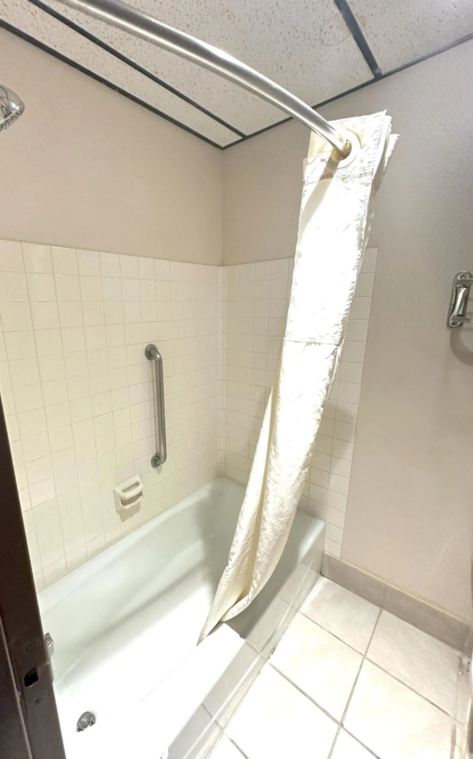 Bathroom in Sunflower Inn & Suites