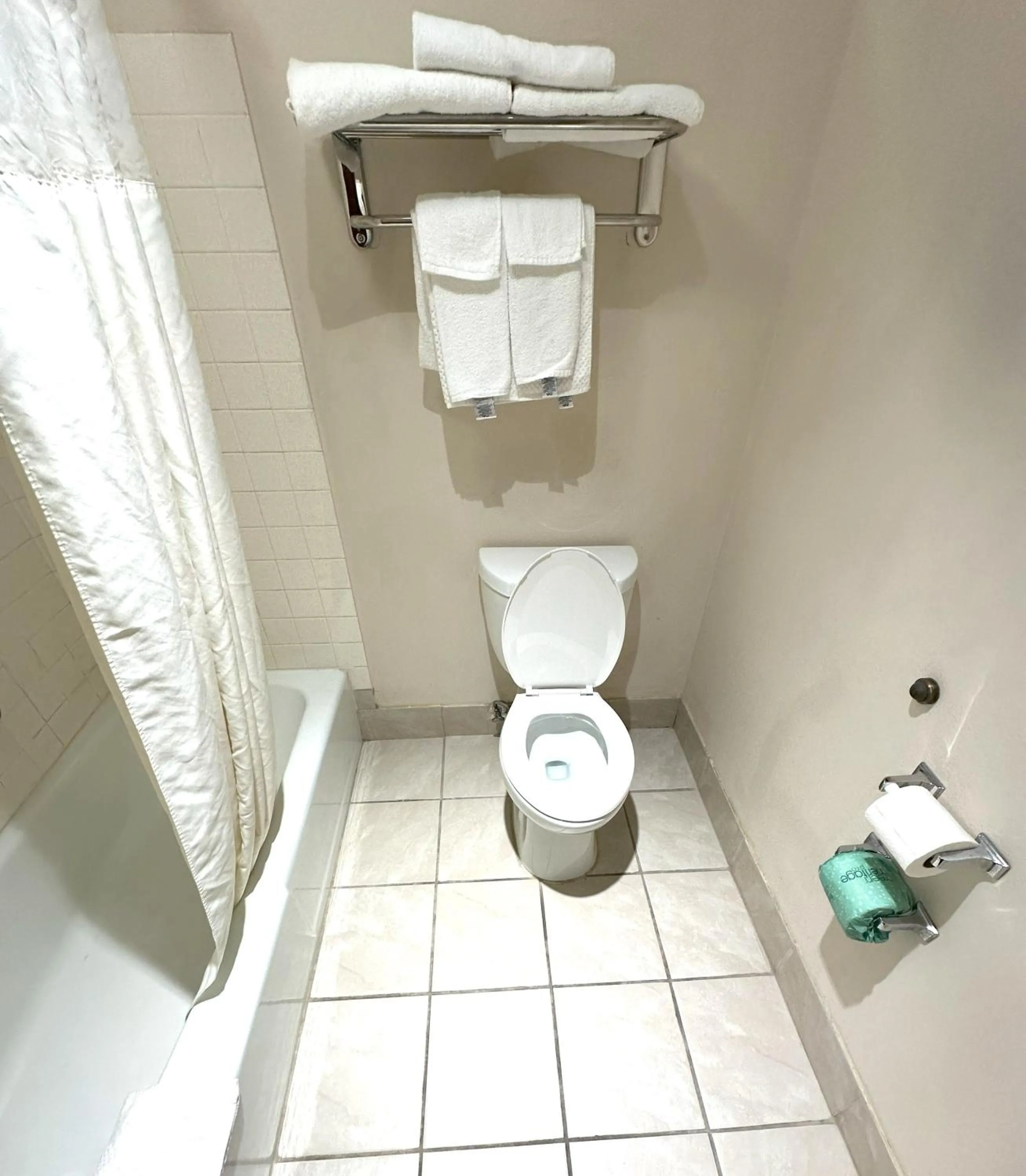 Toilet in Sunflower Inn & Suites