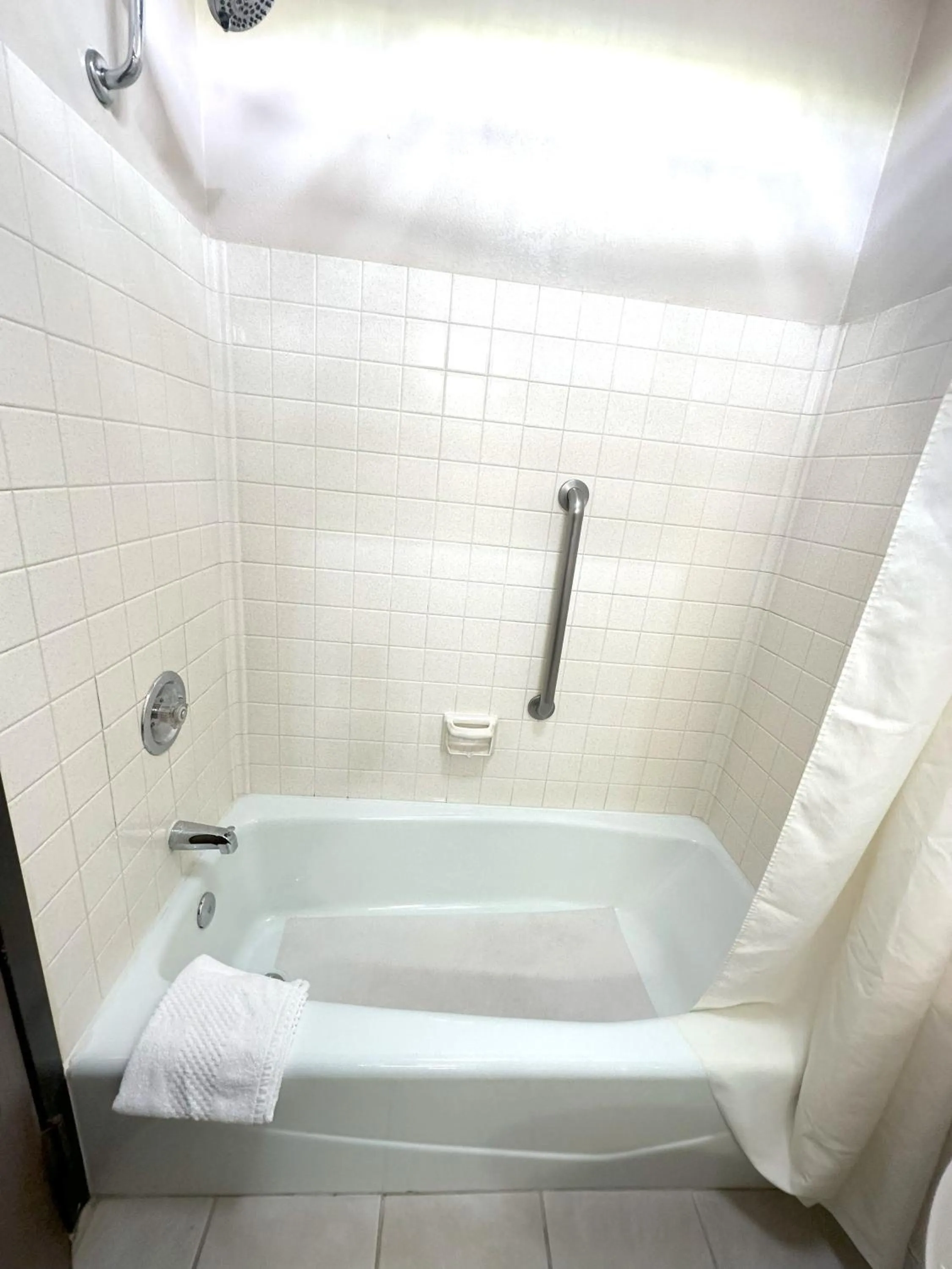 Bathroom in Sunflower Inn & Suites