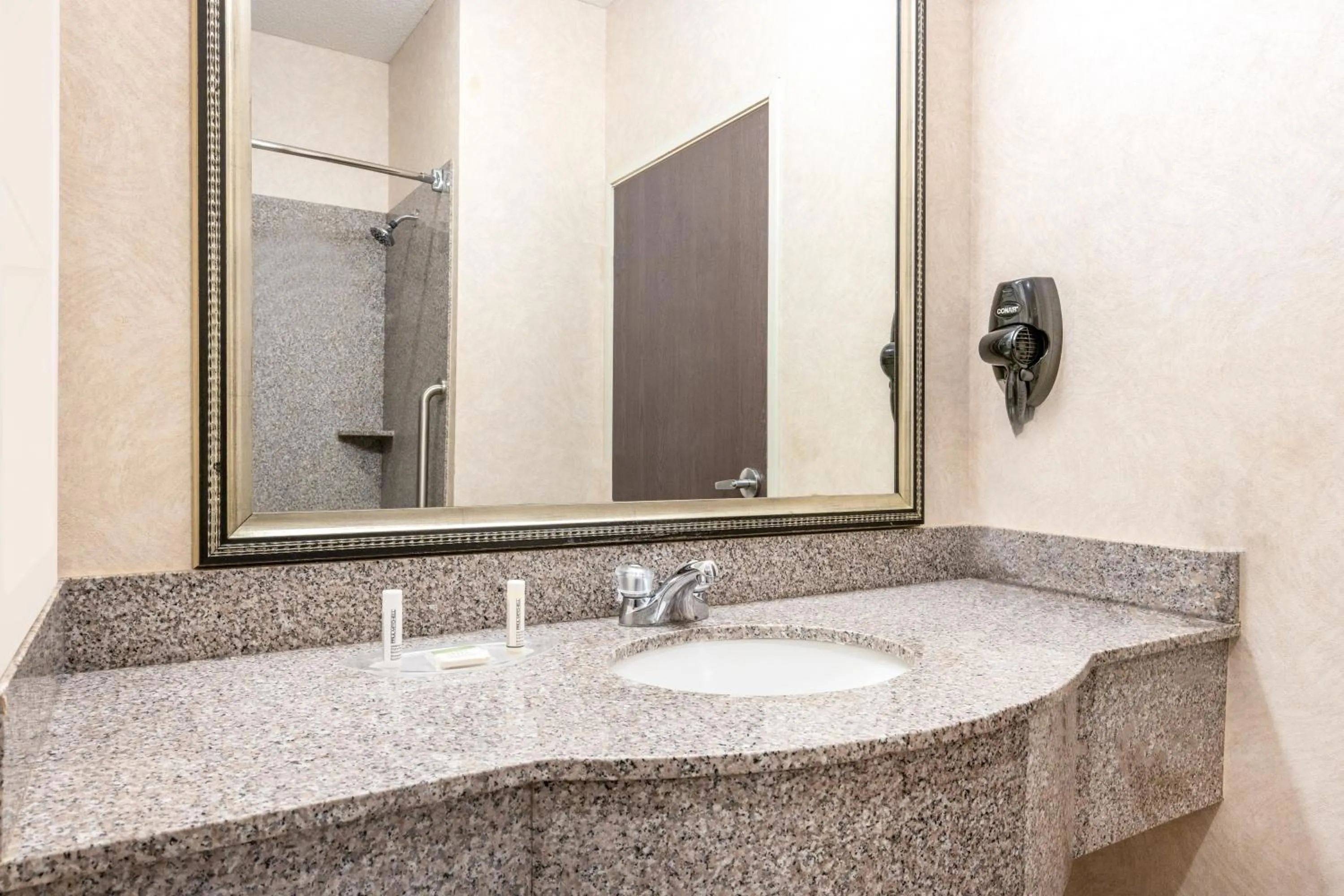 Bathroom in Baymont by Wyndham Pratt