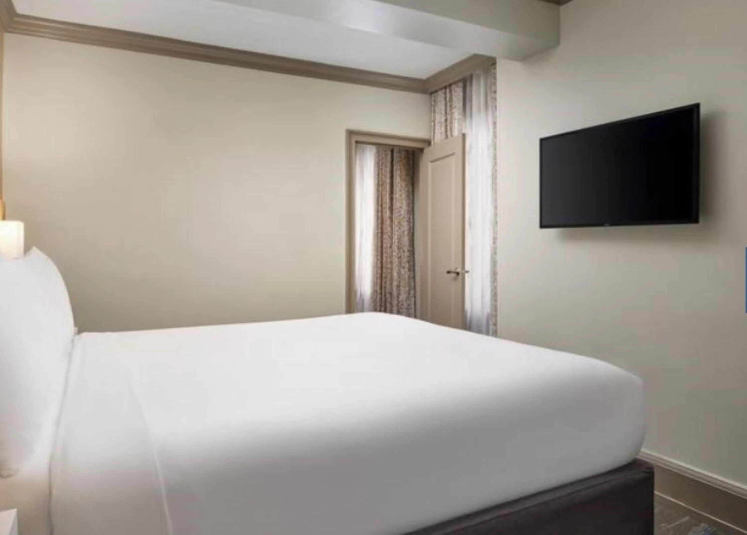 Bed in Hampton Inn & Suites New Orleans Canal St. French Quarter