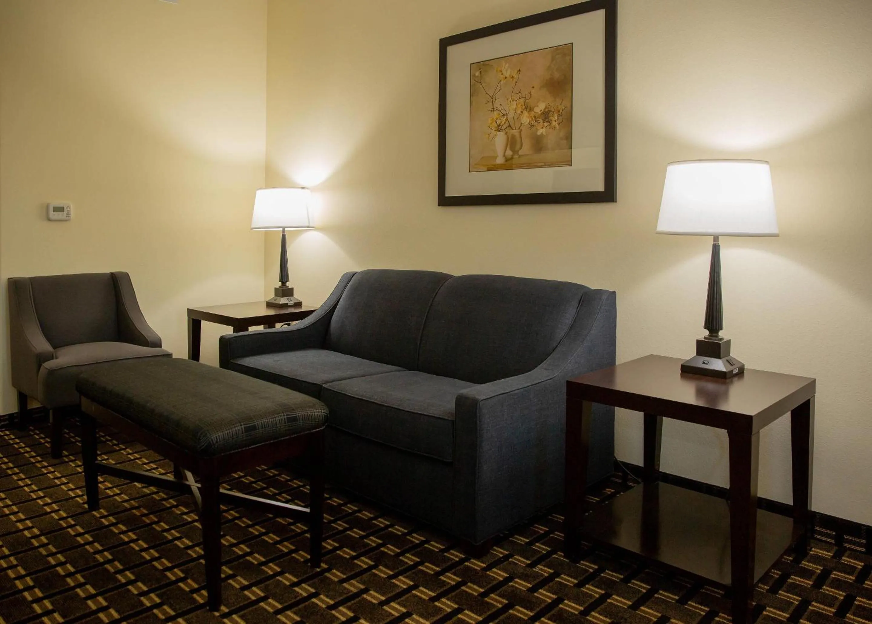 Bedroom in Evangeline Downs Hotel, an Ascend Collection Hotel