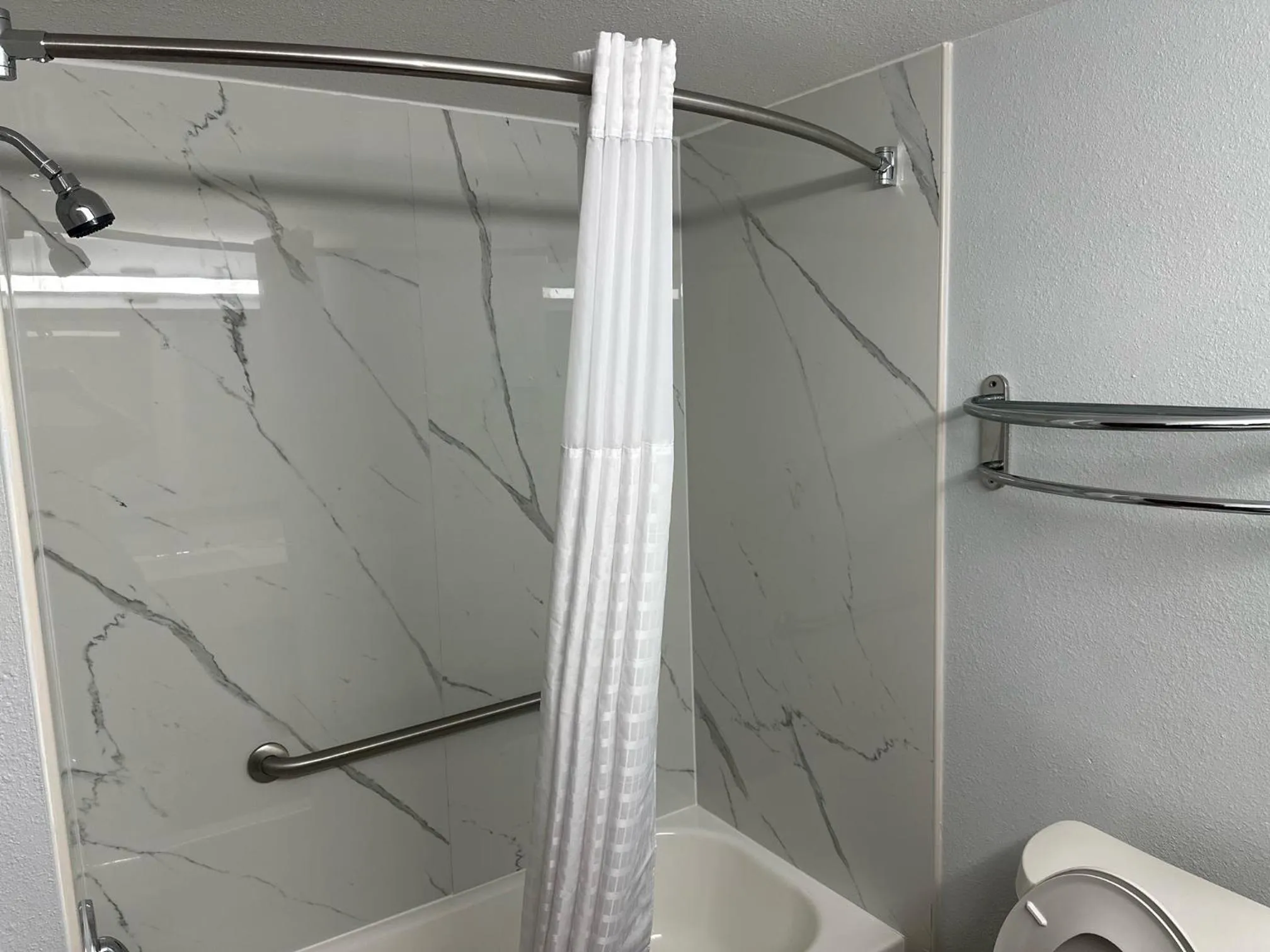 Toilet in Super 8 by Wyndham Alexandria LA