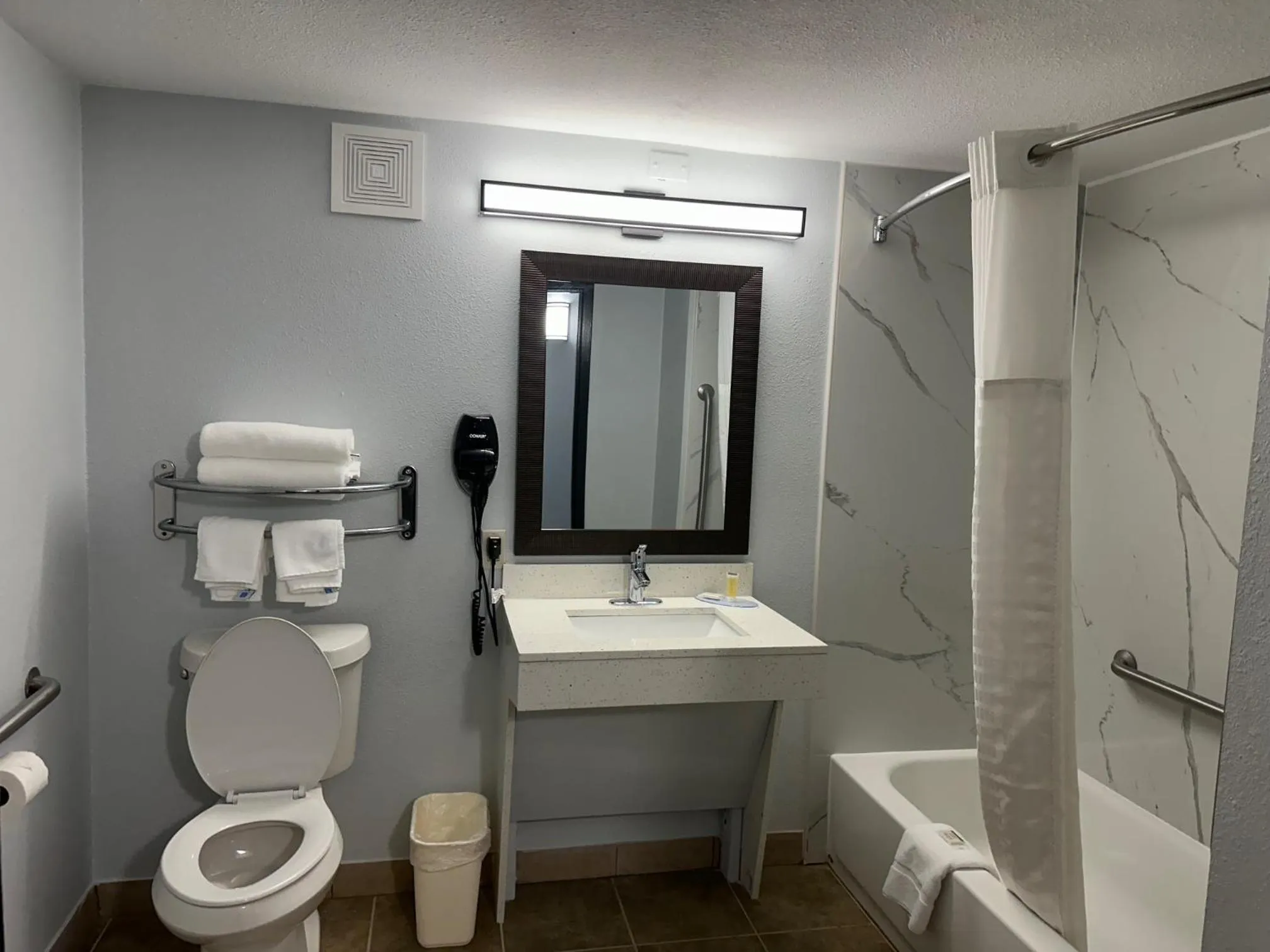 Shower in Super 8 by Wyndham Alexandria LA