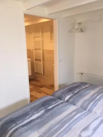 Bedroom, Bed in Oostvoornsch Gastenverblijf