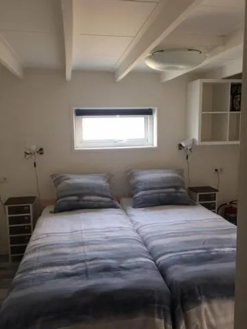 Bedroom, Bed in Oostvoornsch Gastenverblijf