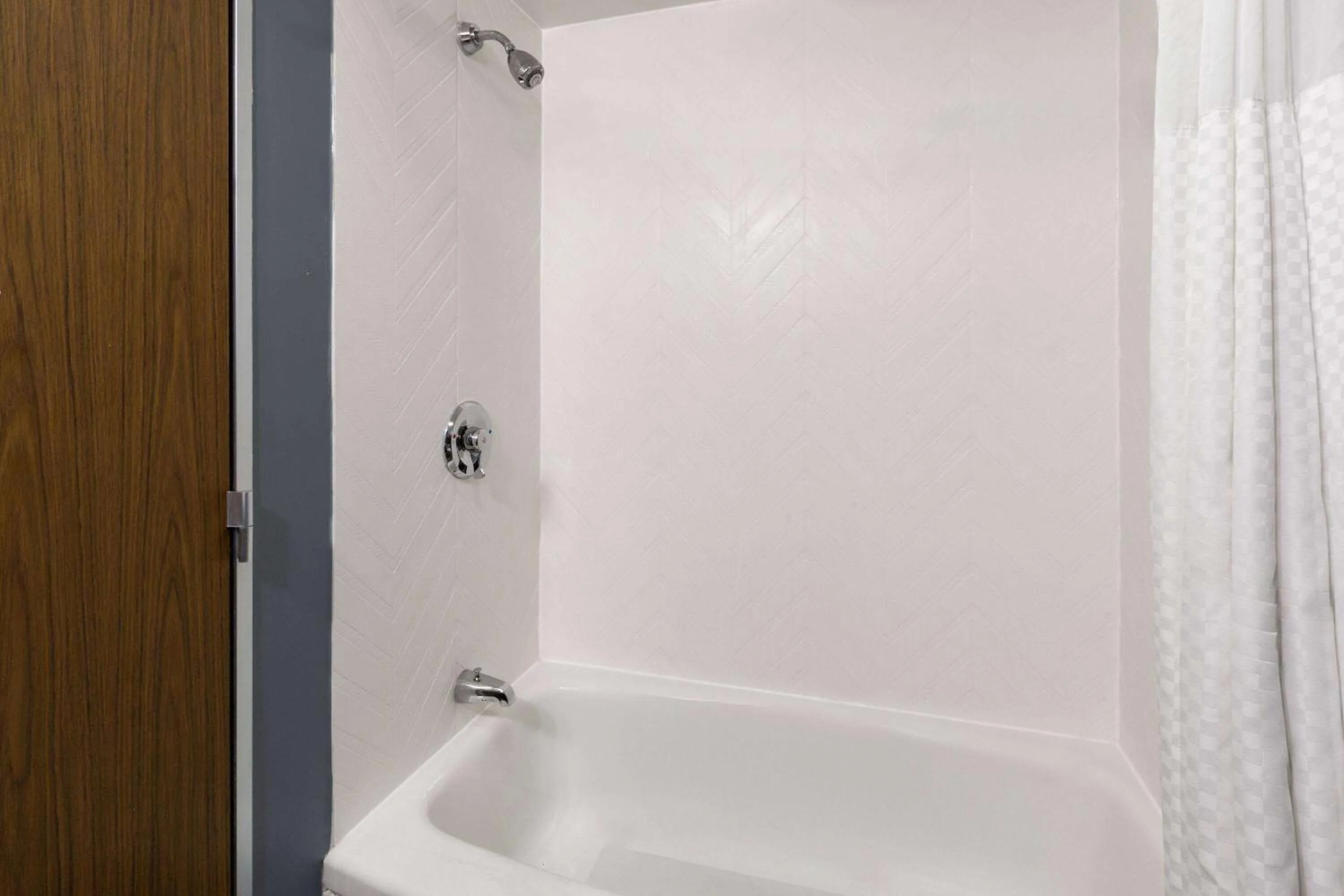 Bathroom in Baymont by Wyndham Bay City