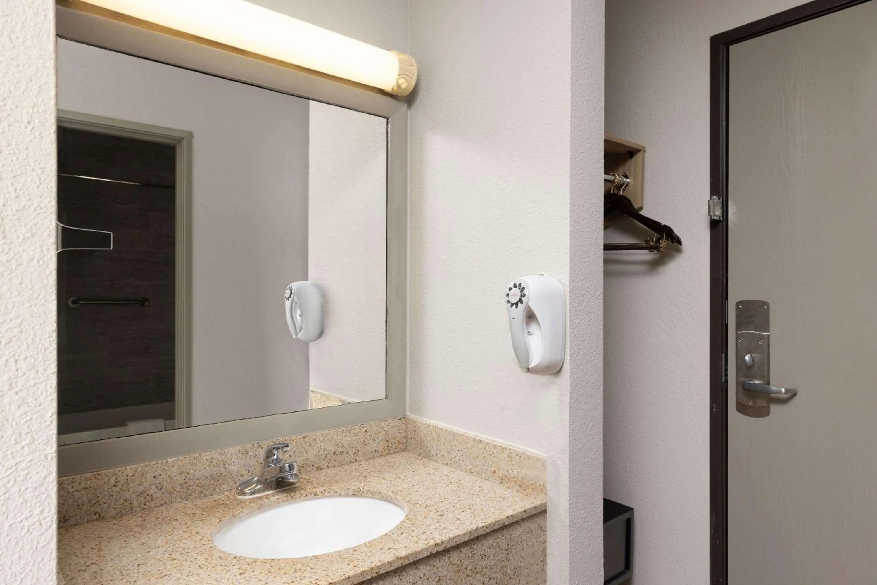 Bathroom in Days Inn by Wyndham Carthage