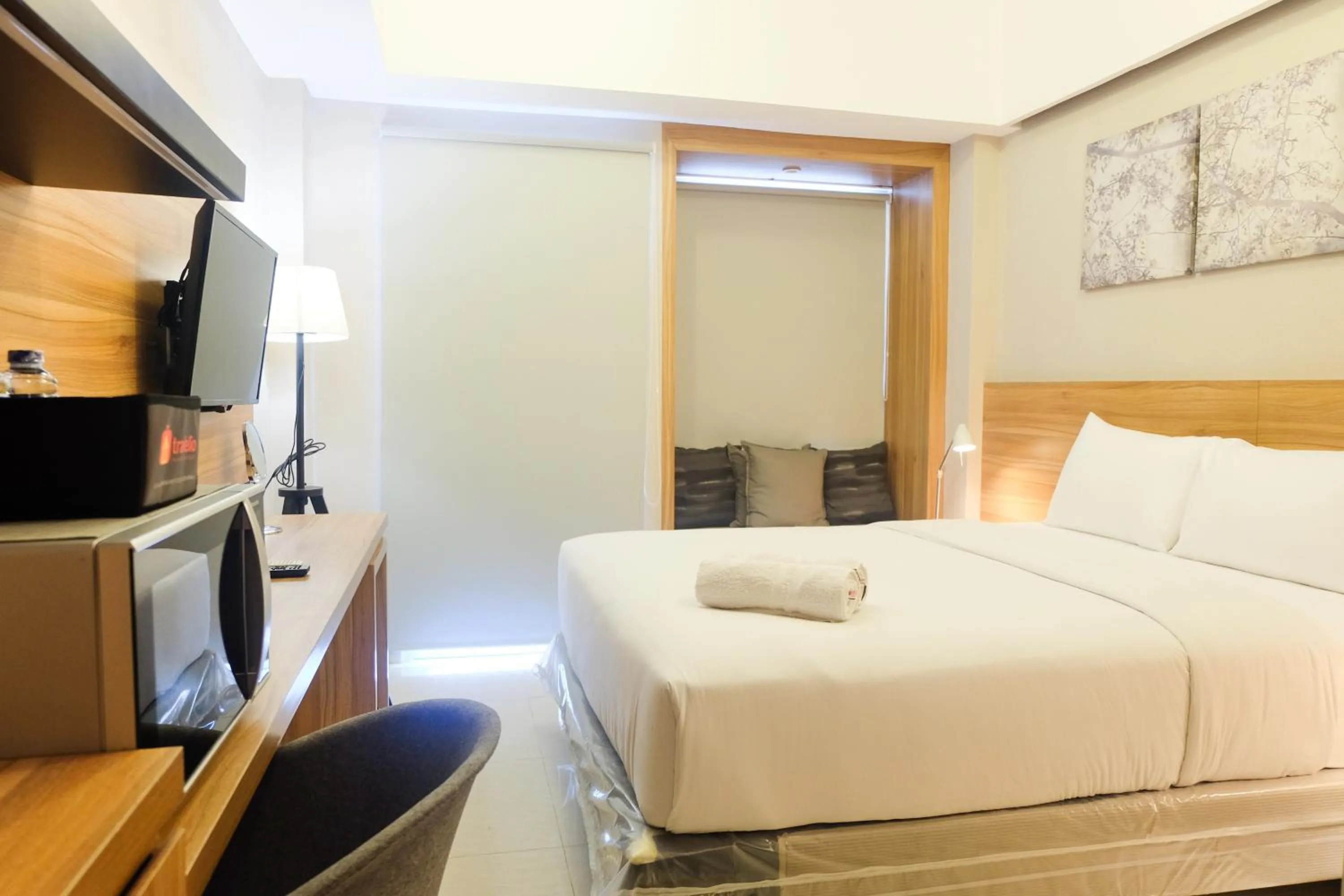 Bed in Modern Apartment Studio No Kitchen Mustika Golf Residence By Travelio