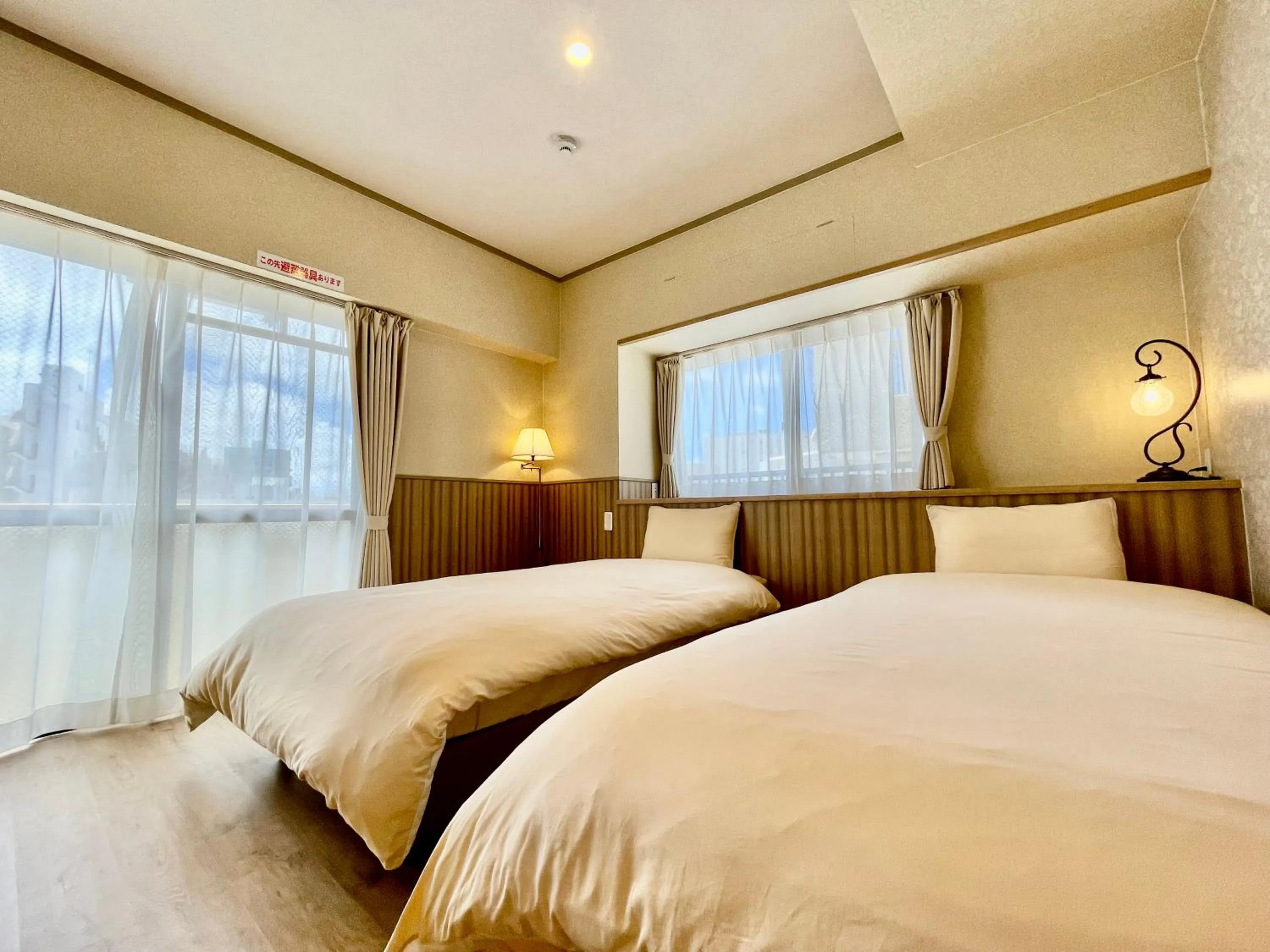 Bed in ホテル天使館 久茂地 -Tenshi-Kan-