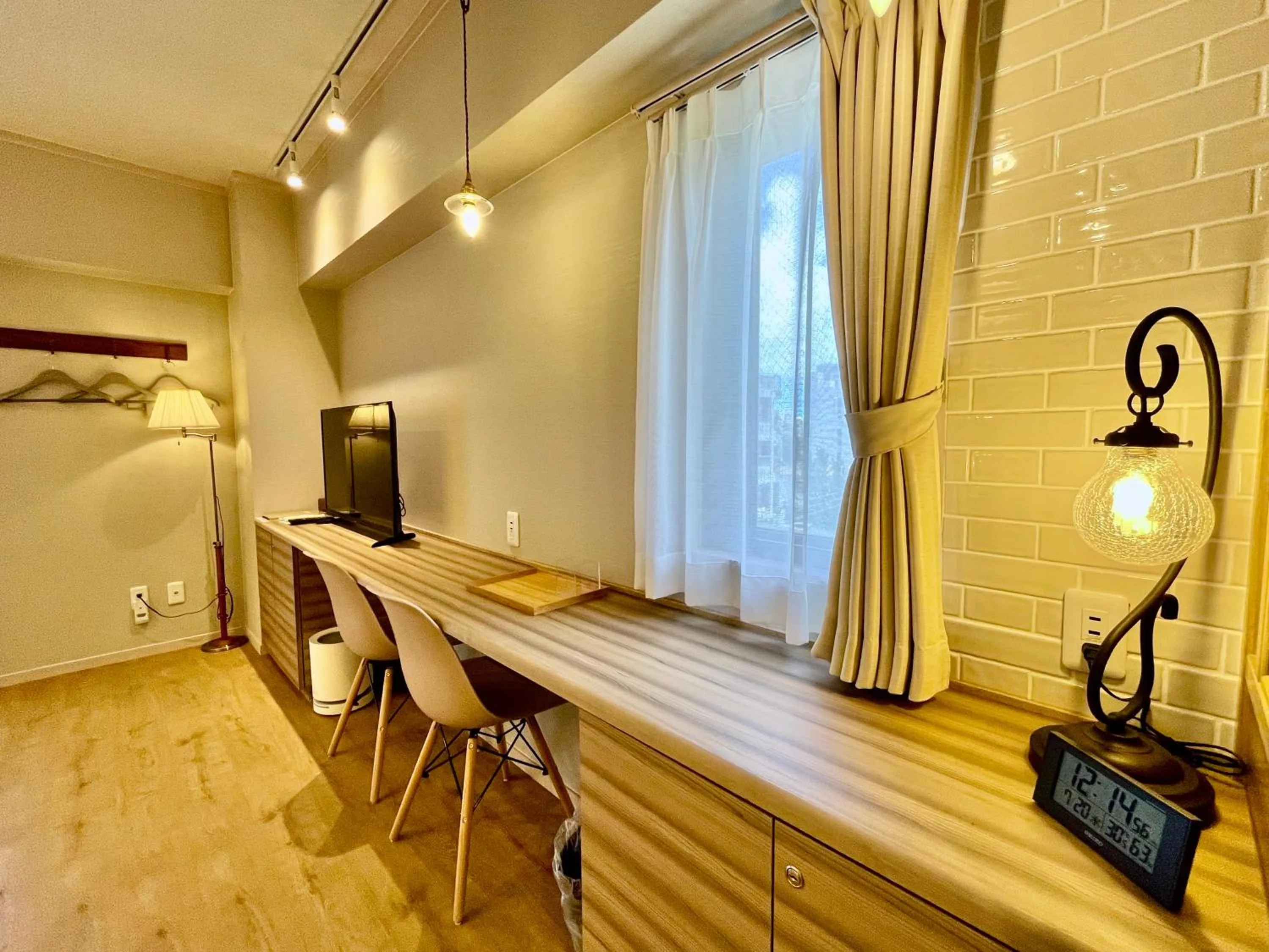 Seating area in ホテル天使館 久茂地 -Tenshi-Kan-