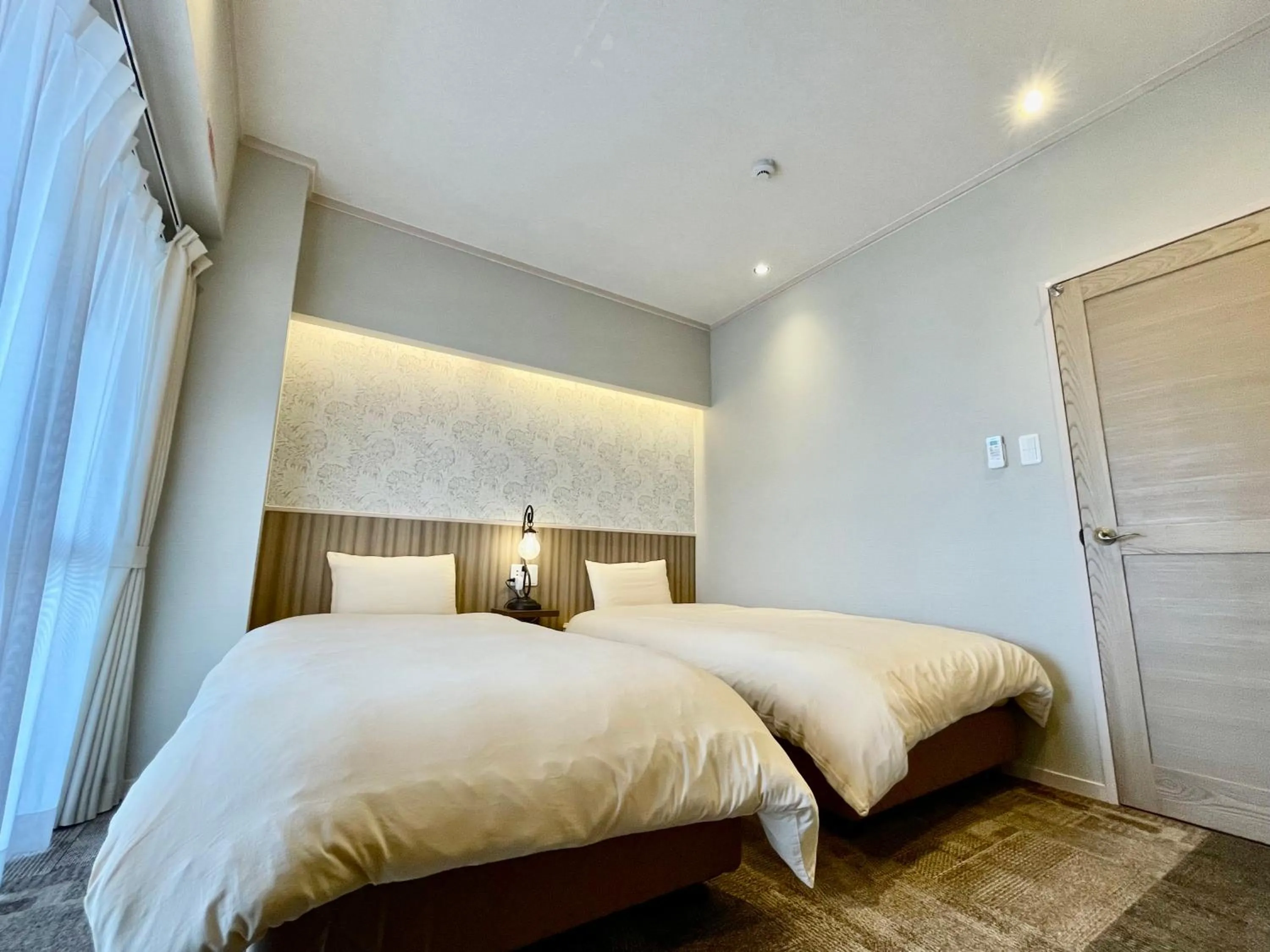 Bed in ホテル天使館 久茂地 -Tenshi-Kan-