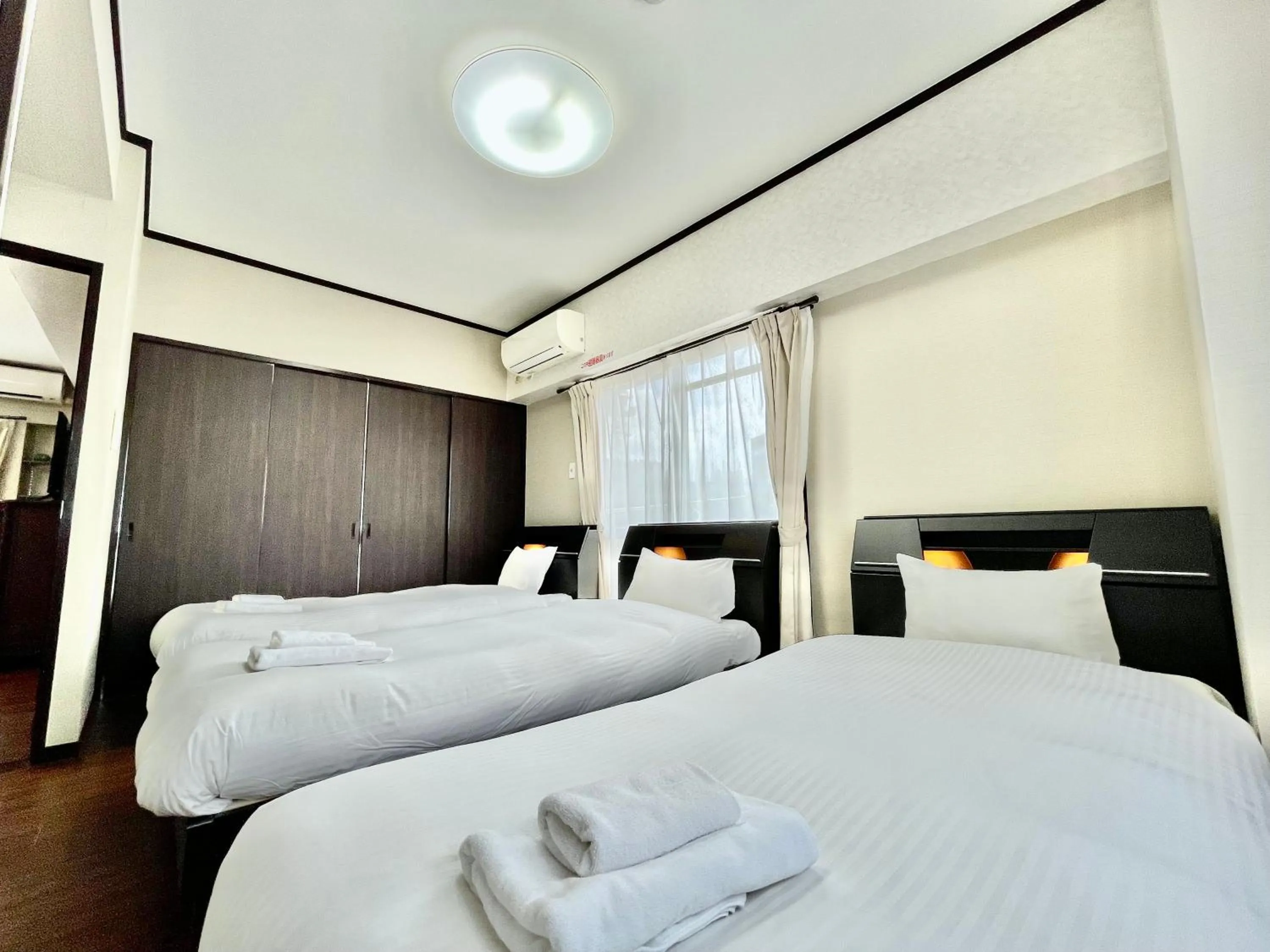 Bed in ホテル天使館 久茂地 -Tenshi-Kan-