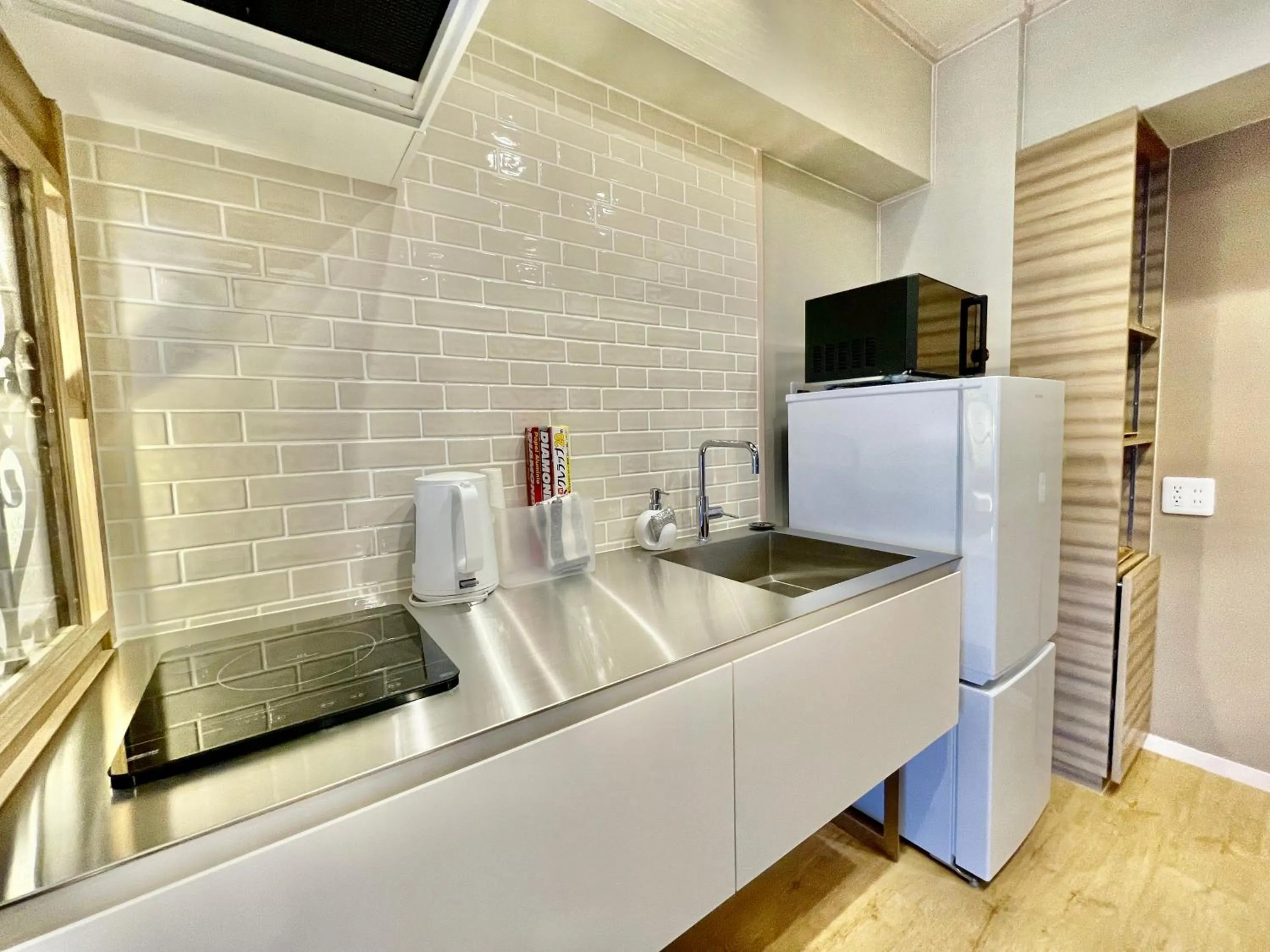 Kitchen or kitchenette in ホテル天使館 久茂地 -Tenshi-Kan-