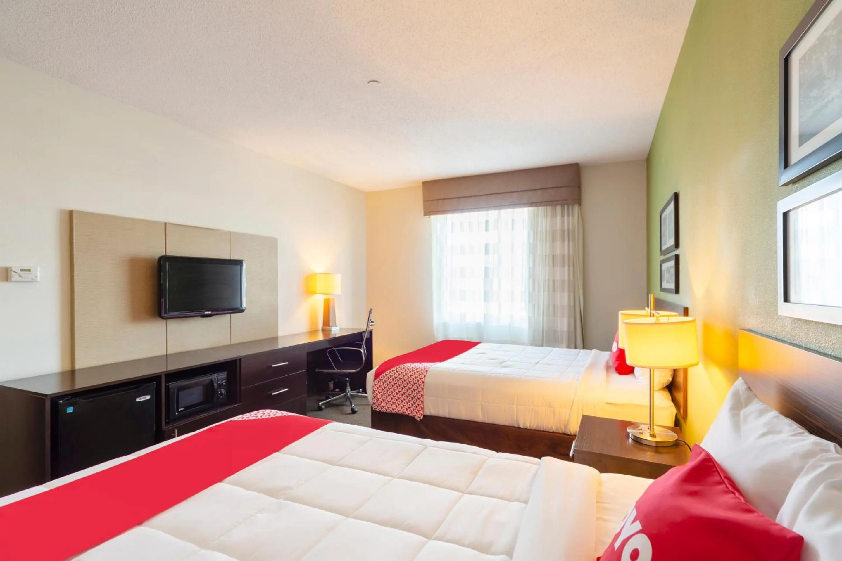 Bedroom in Ramada by Wyndham Jackson MS