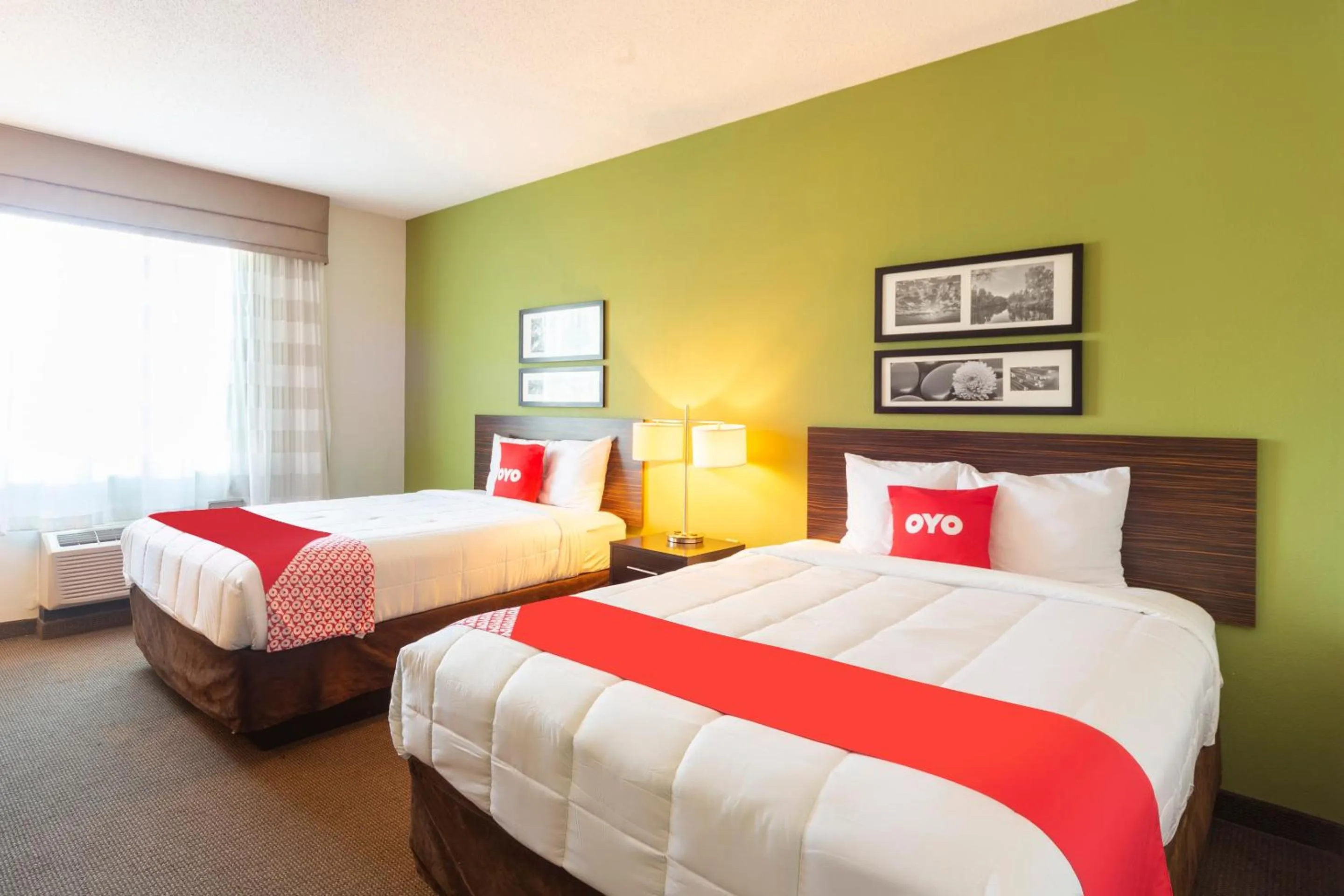 Bedroom in Ramada by Wyndham Jackson MS