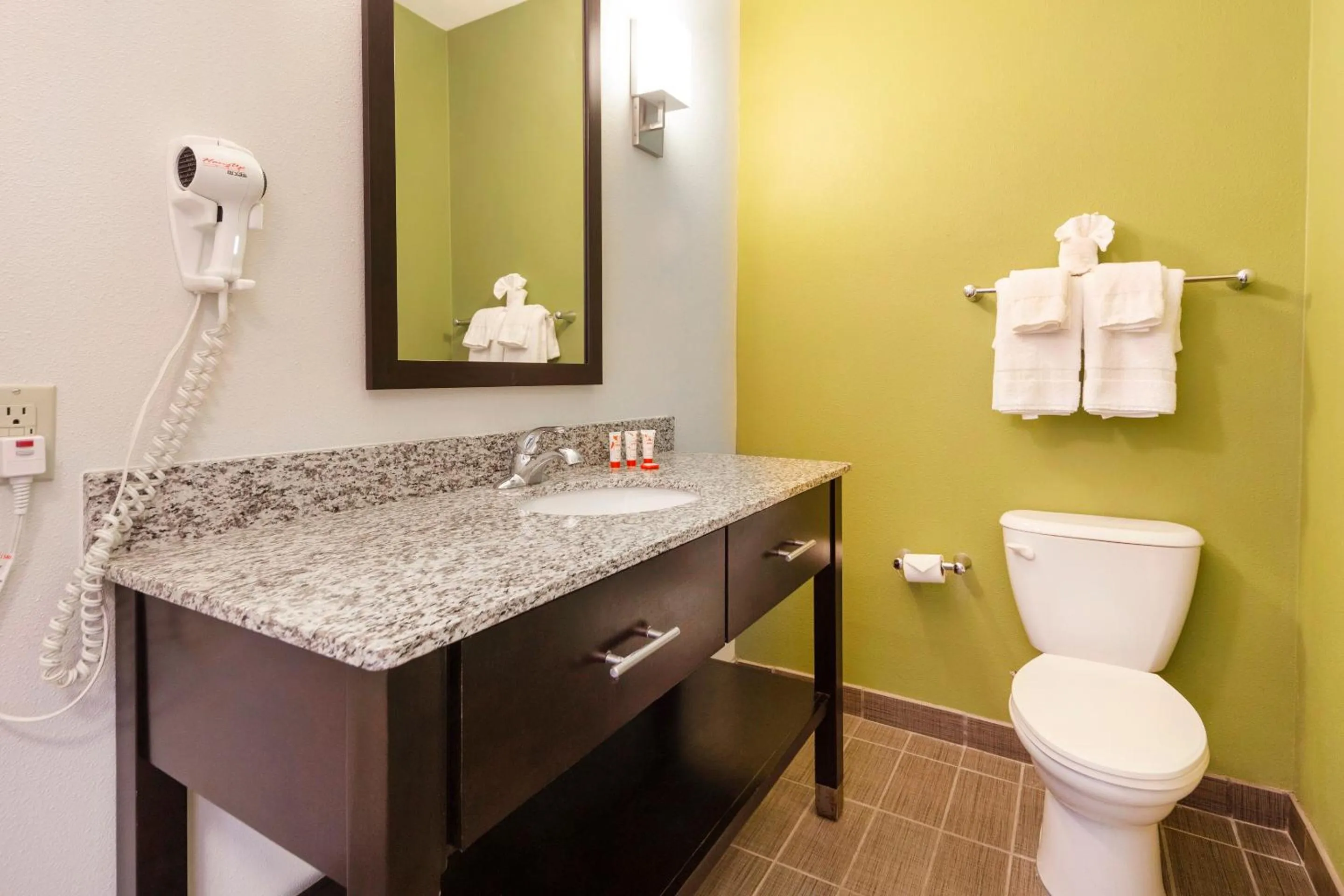Bathroom in Ramada by Wyndham Jackson MS