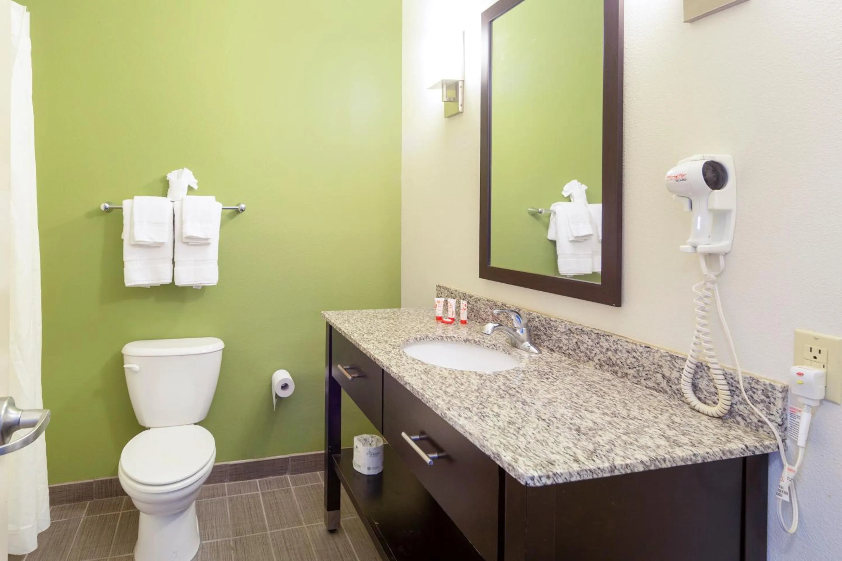 Bathroom in Ramada by Wyndham Jackson MS