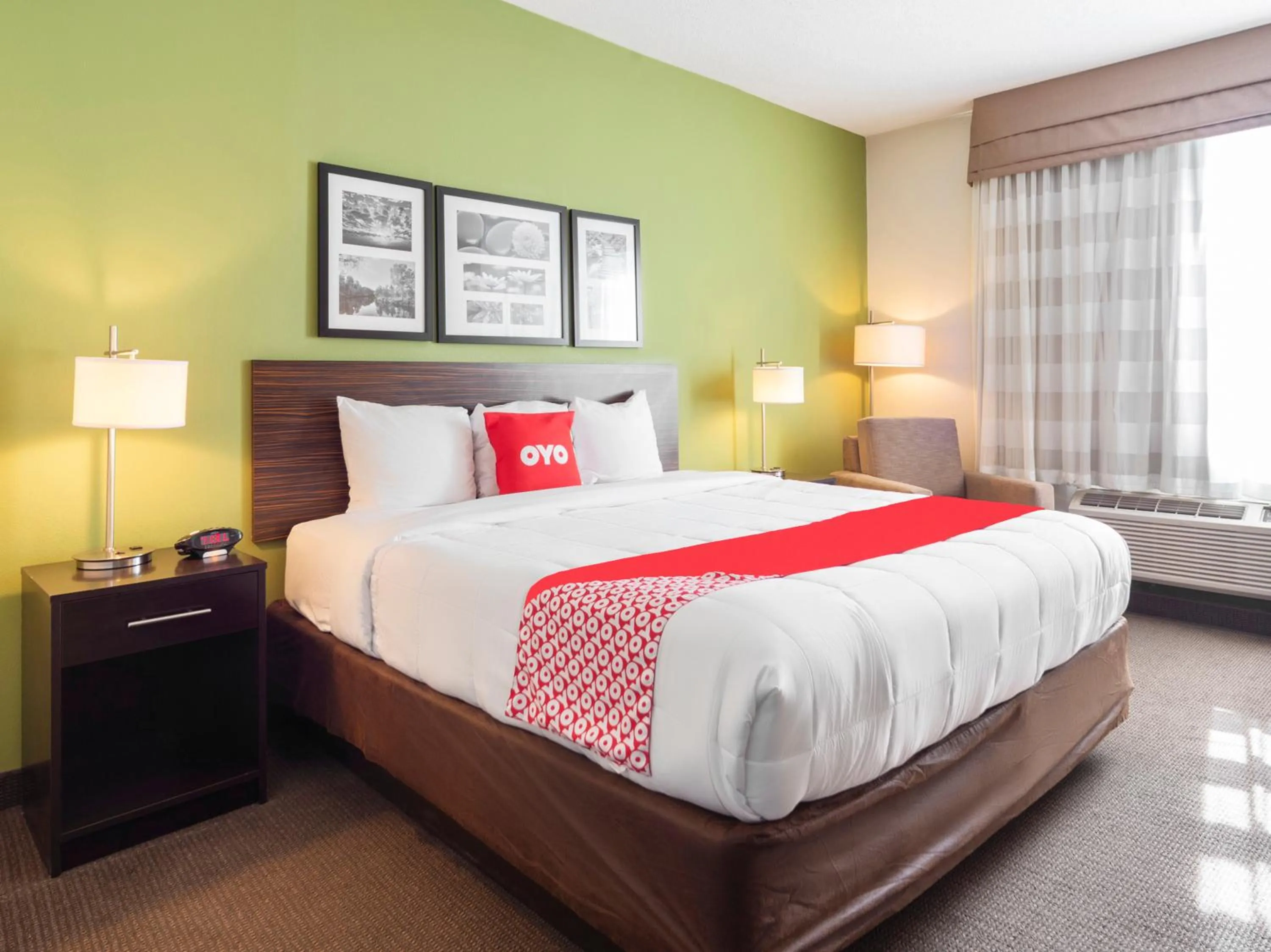 Bedroom in Ramada by Wyndham Jackson MS