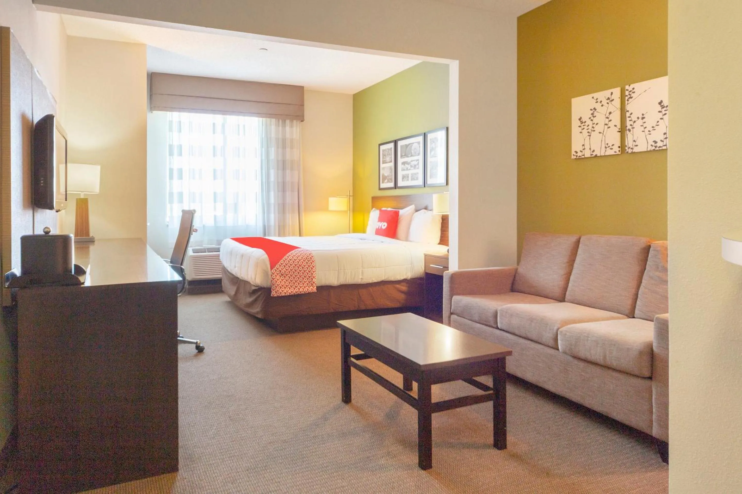 Bedroom in Ramada by Wyndham Jackson MS