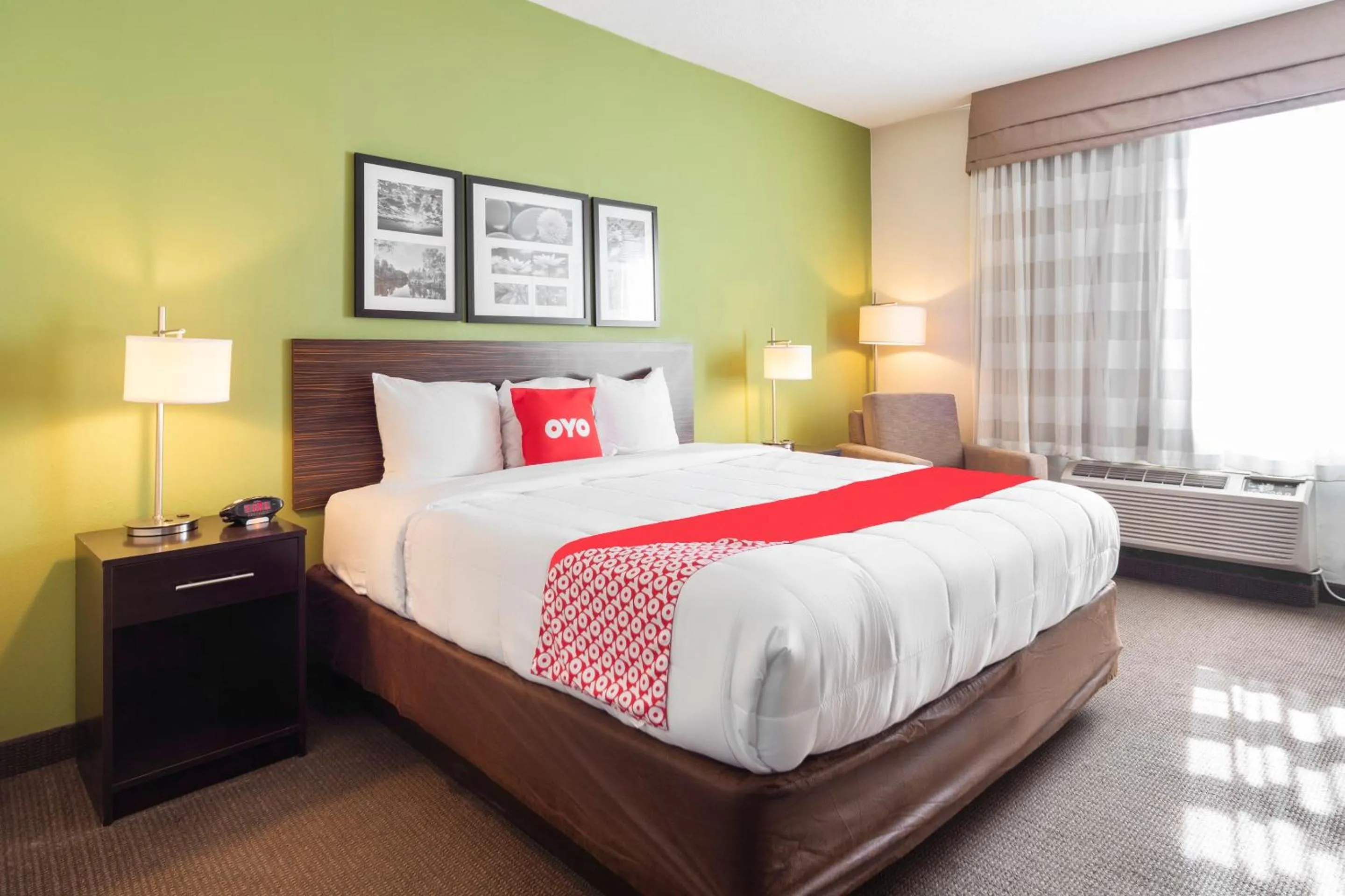 Bedroom in Ramada by Wyndham Jackson MS