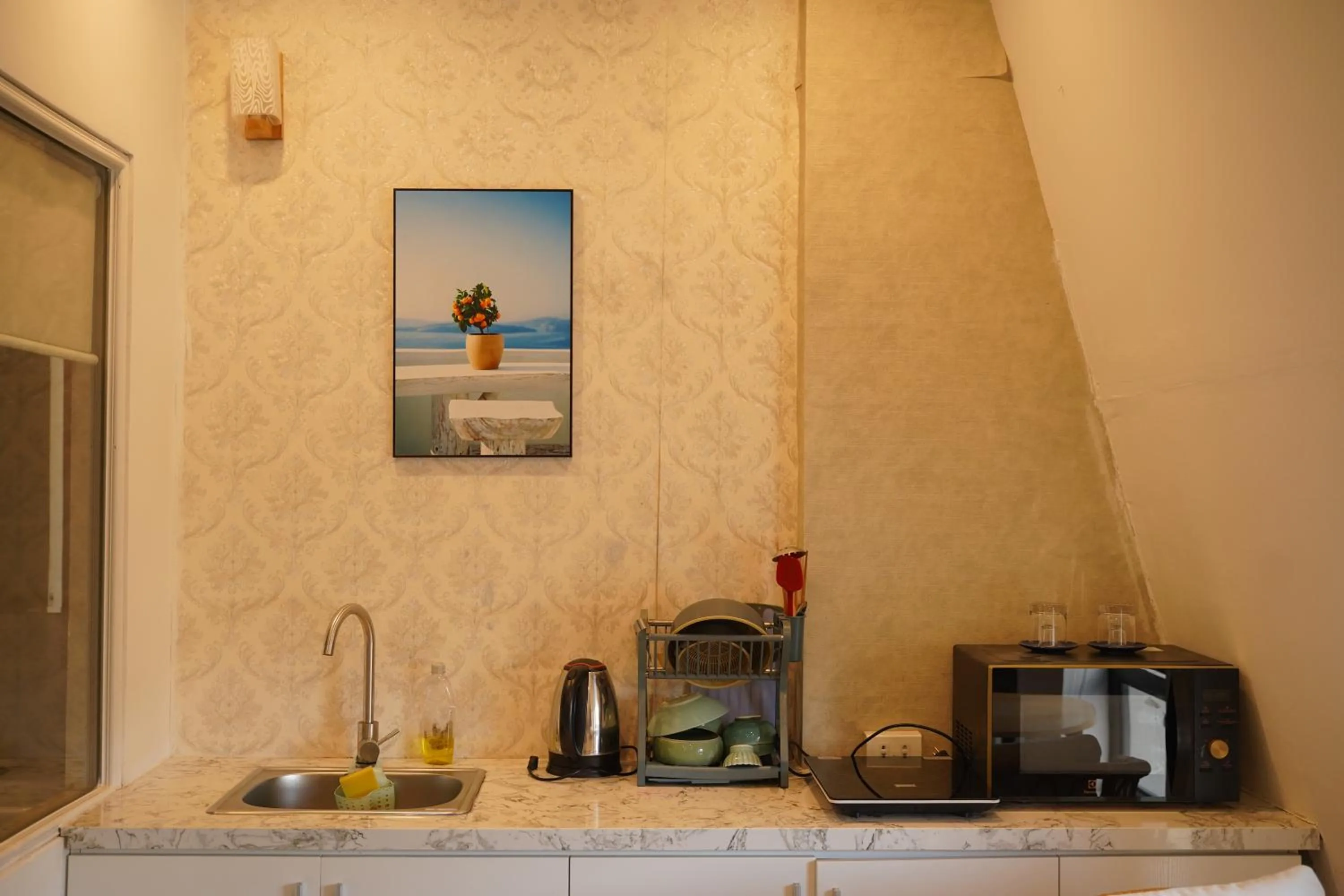 Kitchen or kitchenette in Ngàn Phố Studio & Love Hotel