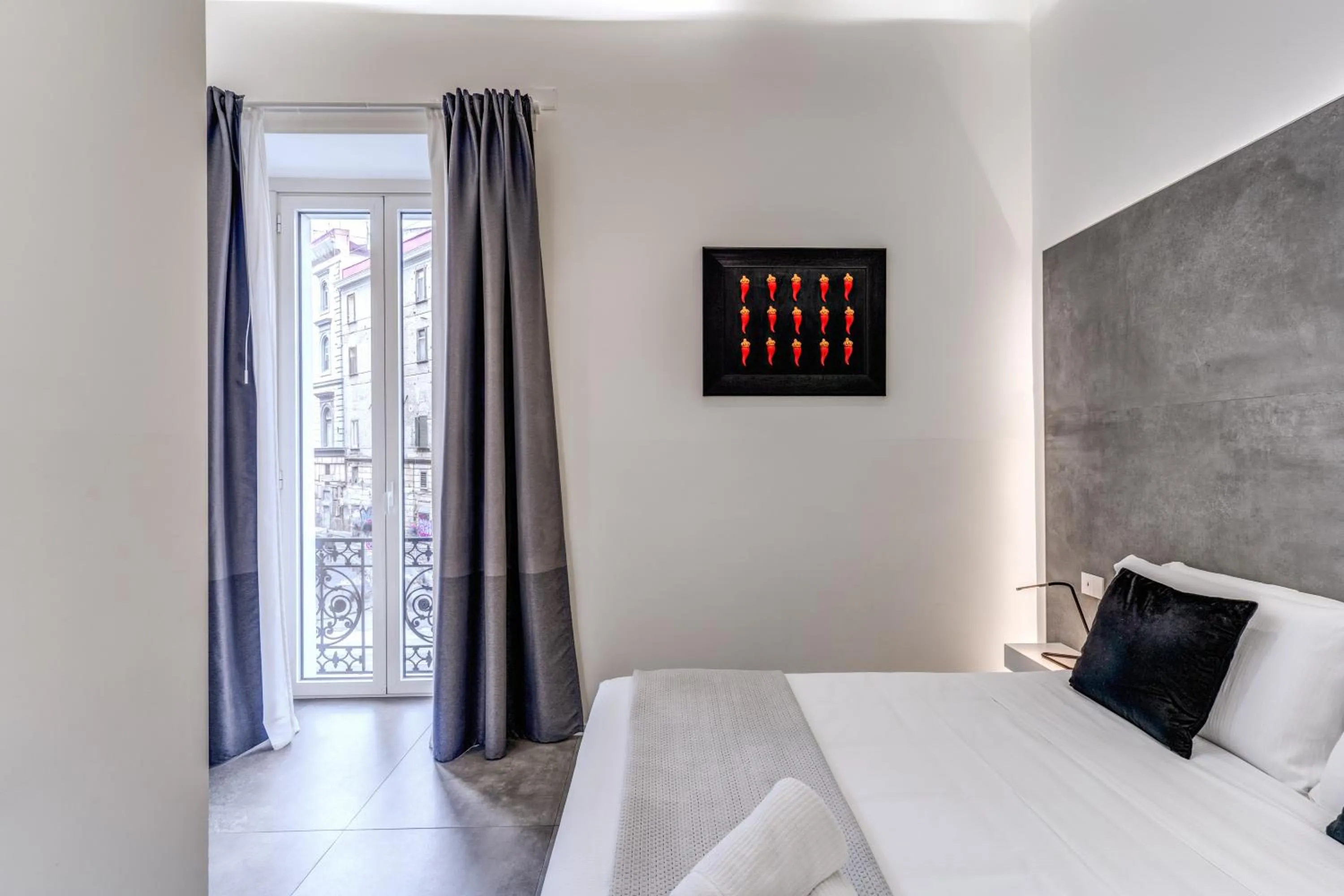 Photo of the whole room, Bed in Gallery Suite Naples