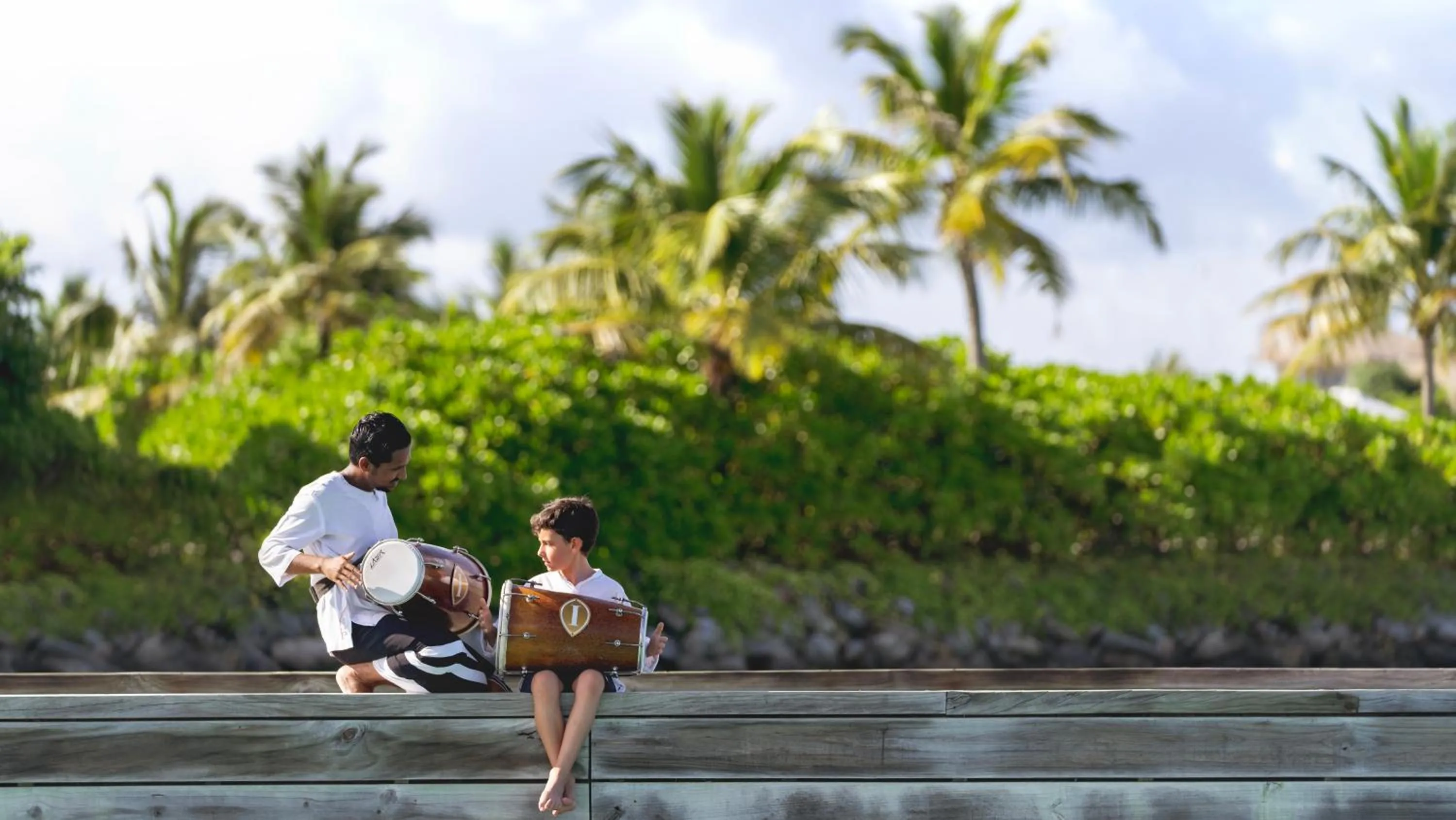 young children in Intercontinental Maldives Maamunagau Resort with Club benefits by IHG