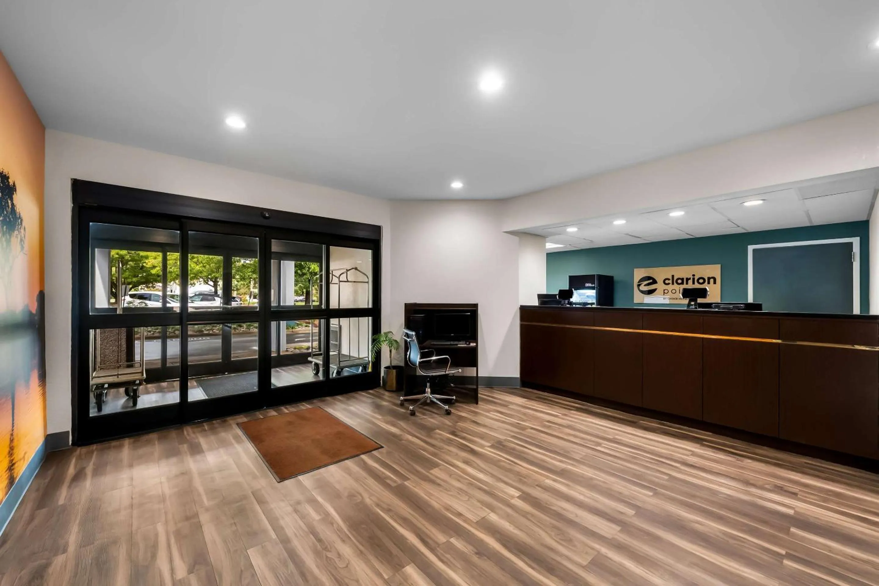 Lobby or reception in Clarion Pointe Apex - Holly Springs