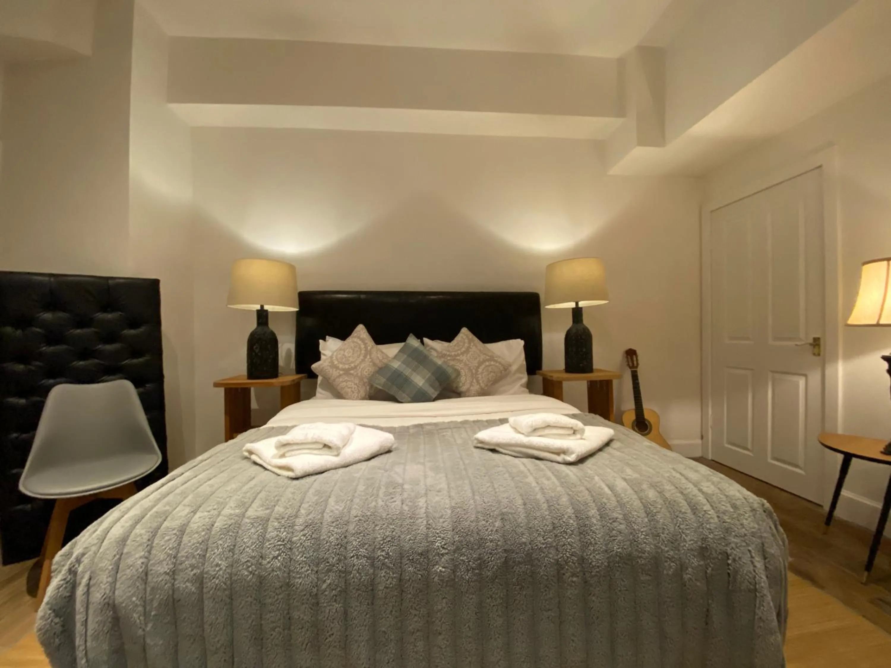 Bed in Queen Street Boutique Suites