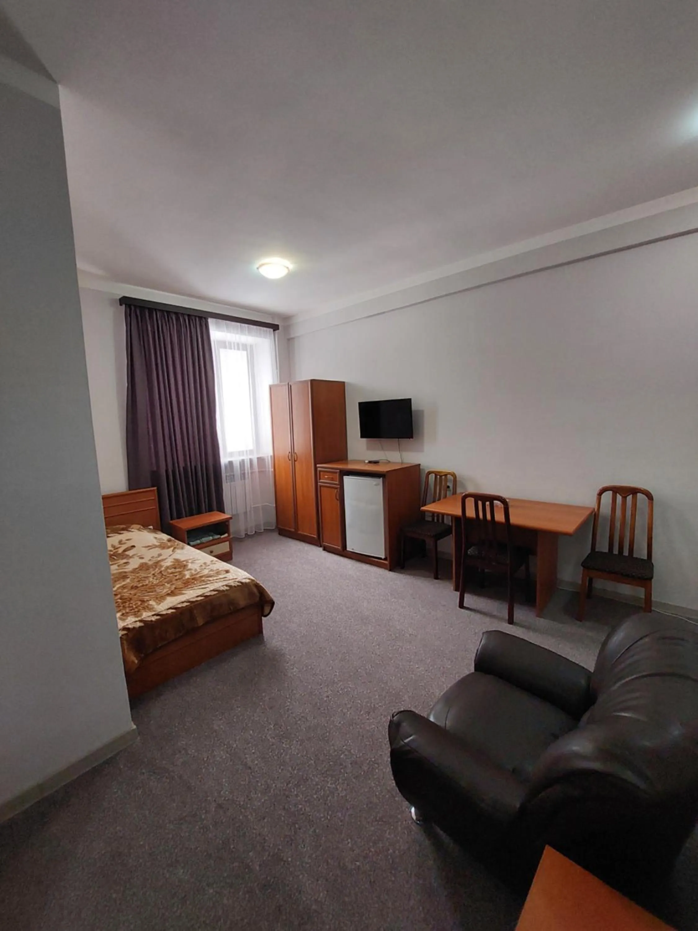 Bed in University Hotel Tsakhkadzor