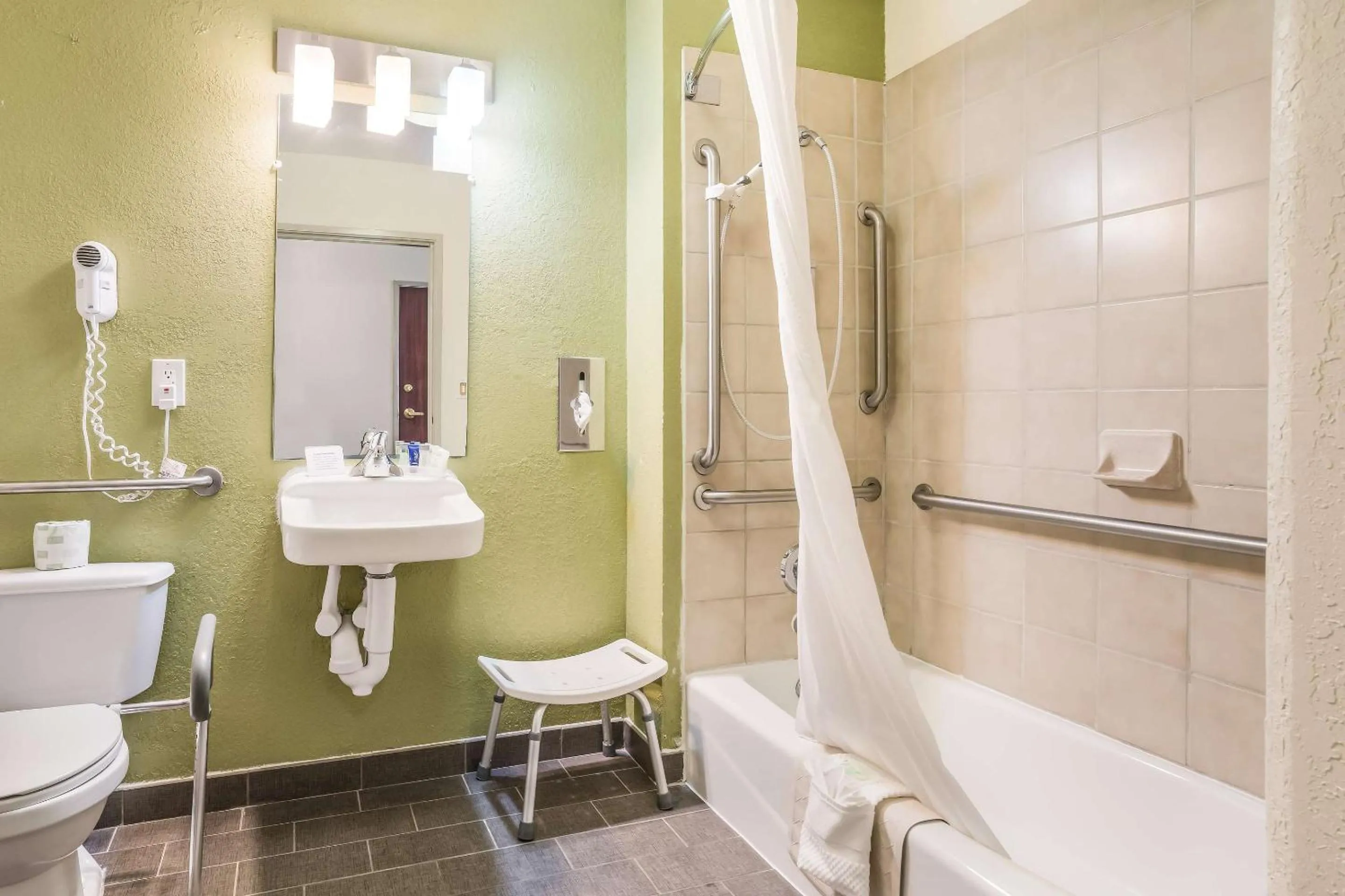 Bedroom in Sleep Inn & Suites Jacksonville near Camp Lejeune