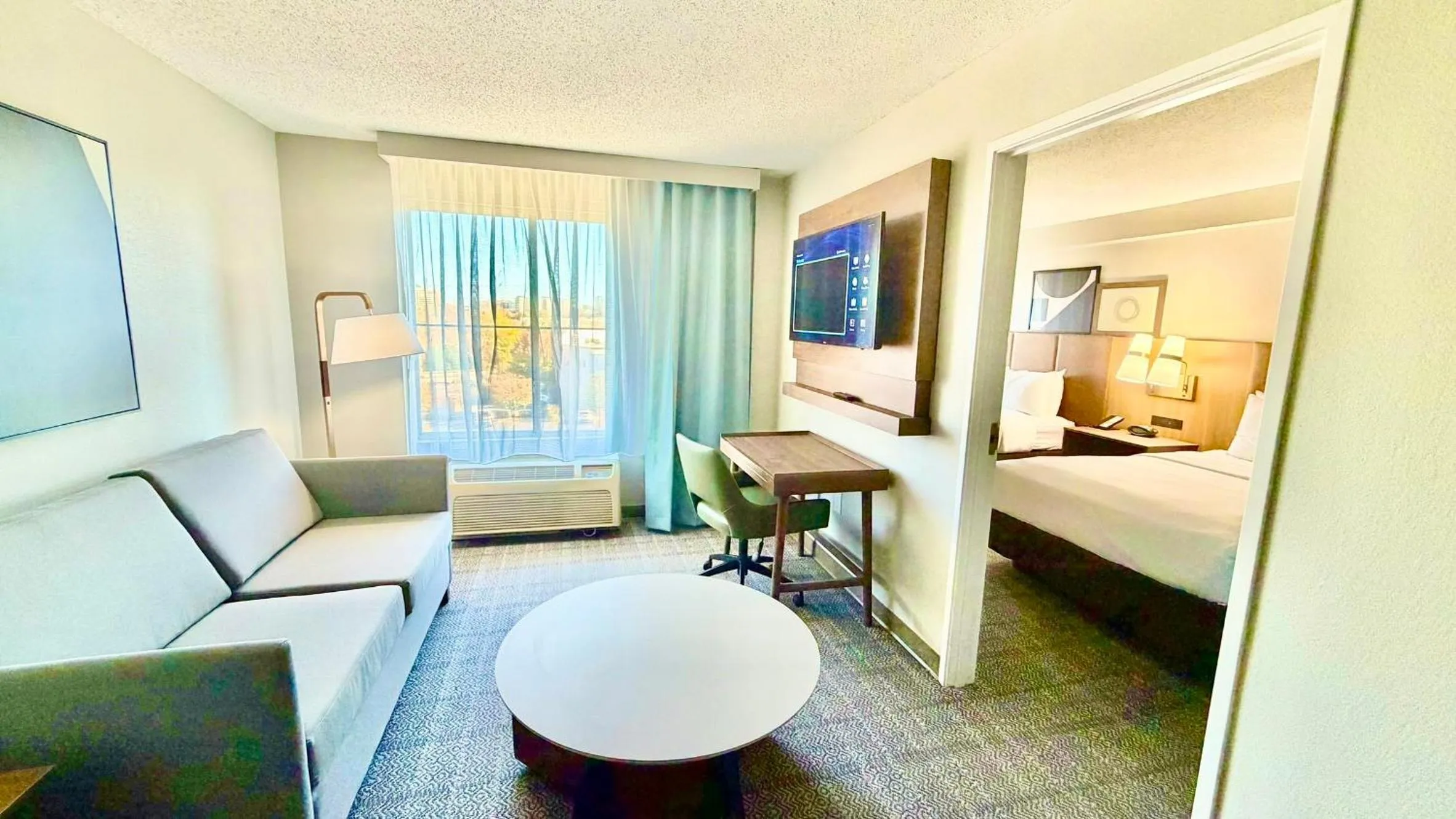 Photo of the whole room, Bed in Concord Suites by IHG