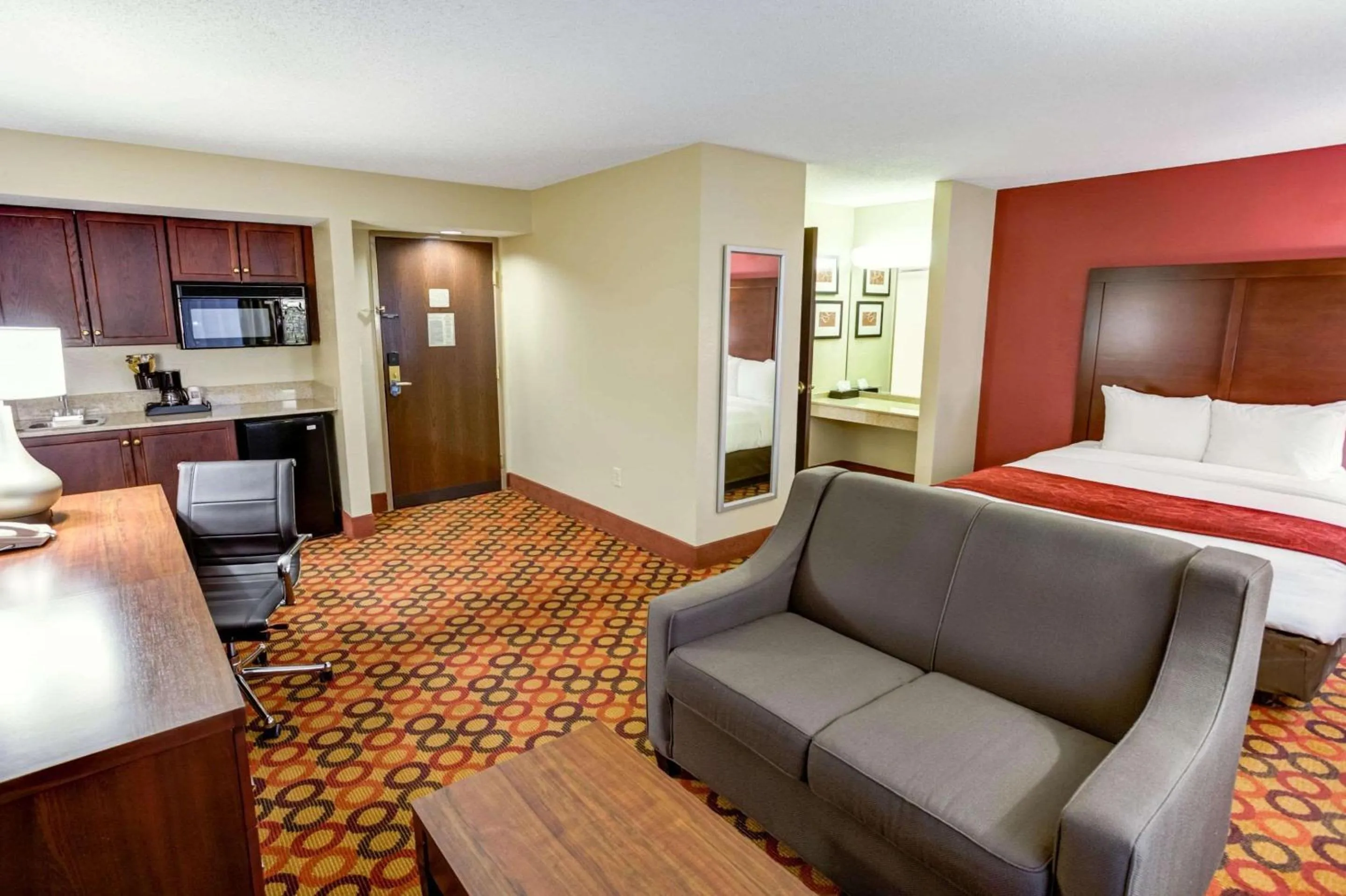 Living room, Bed in Concord Suites by IHG